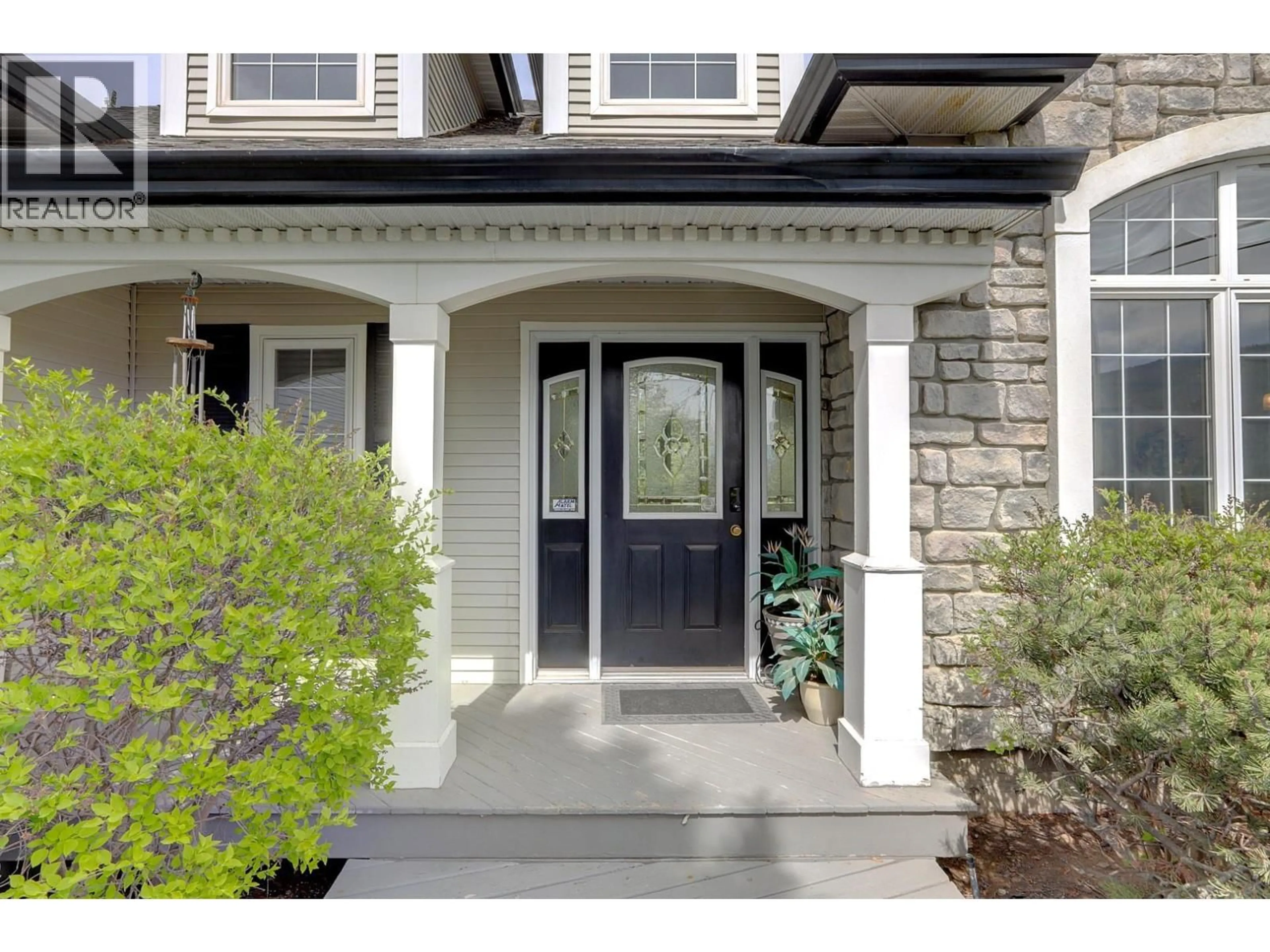 Home with vinyl exterior material, street for 1101 PHOENIX DRIVE, Vernon British Columbia V1B3M4