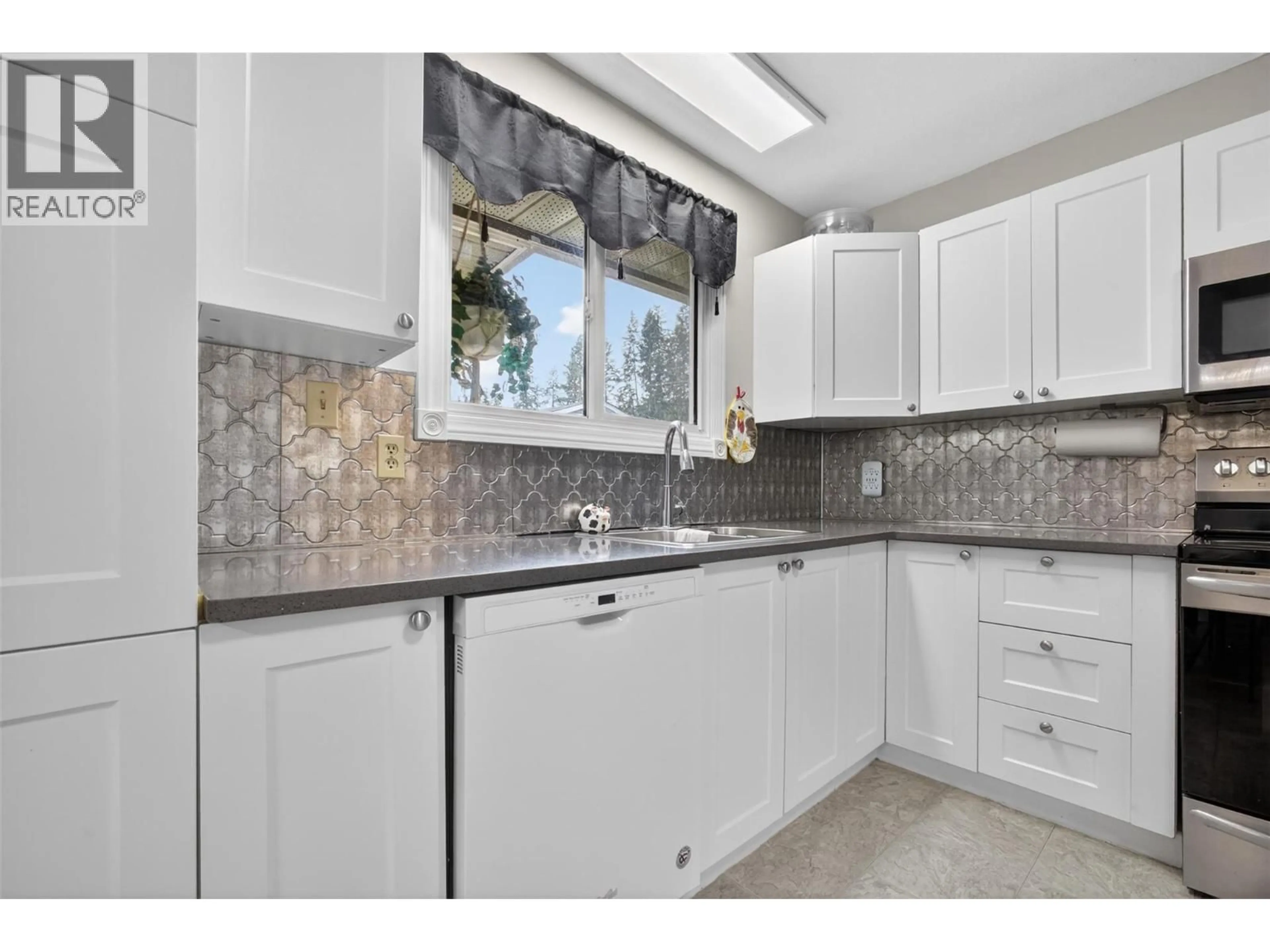 Standard kitchen, ceramic/tile floor for 3163 MCCOY ROAD, West Kelowna British Columbia V4T1A8