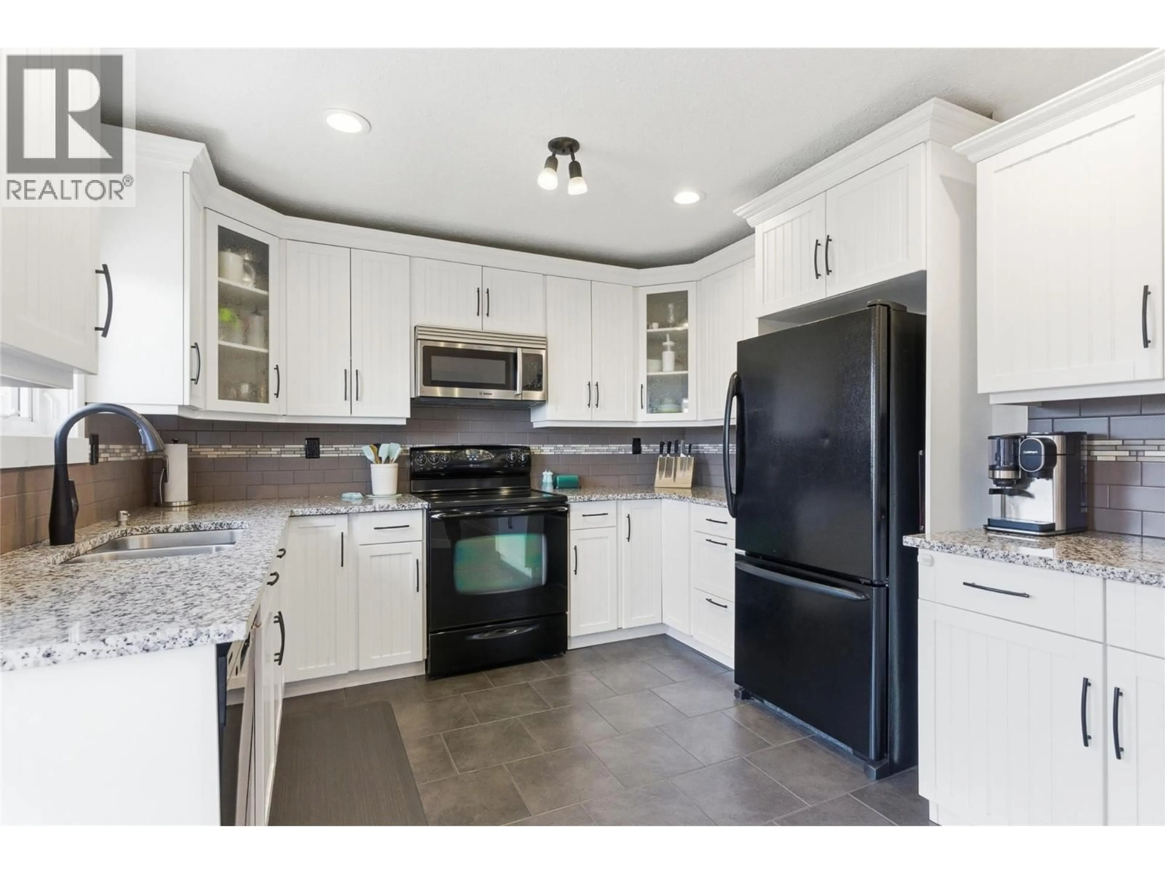 Open concept kitchen, ceramic/tile floor for 849 FLEMING DRIVE, Kamloops British Columbia V1S1B6