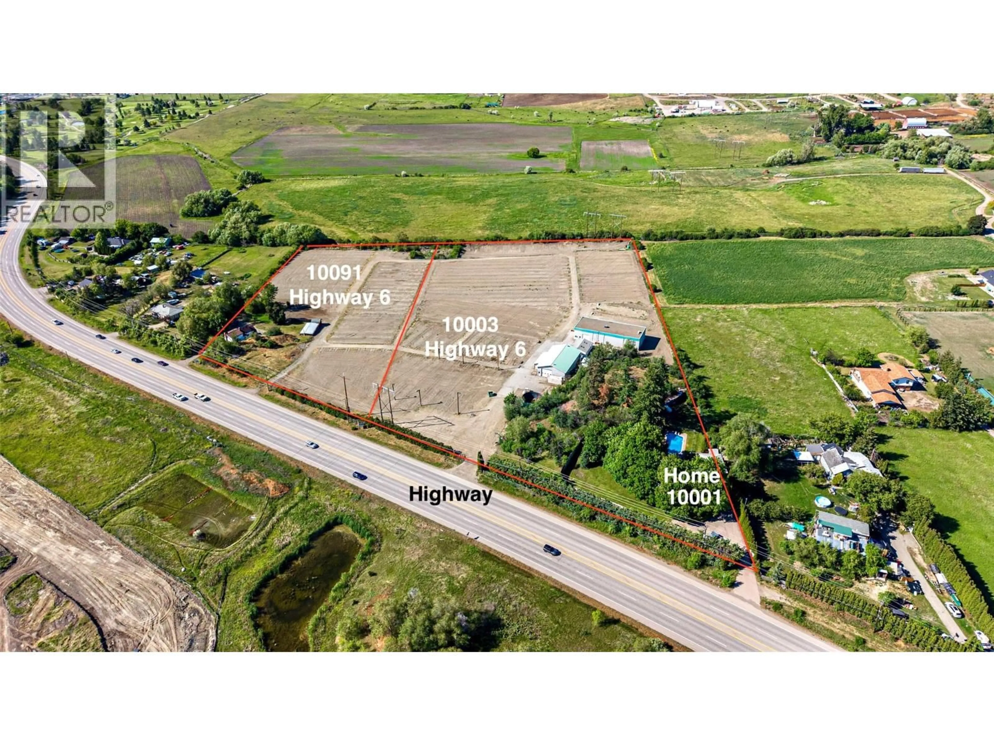 A pic from outside/outdoor area/front of a property/back of a property/a pic from drone, building for 10003 6 HIGHWAY, Coldstream British Columbia V1B3B6
