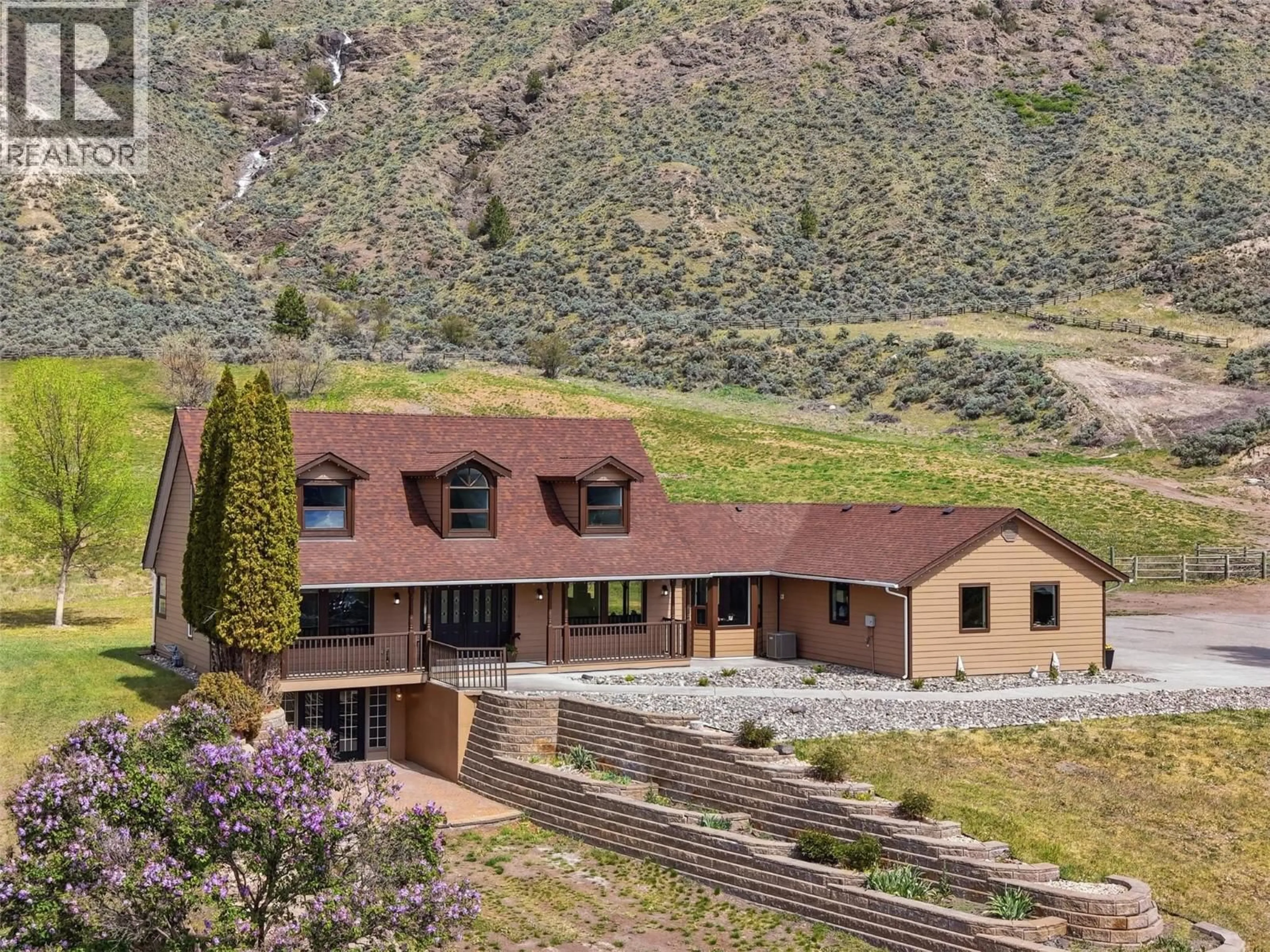 A pic from outside/outdoor area/front of a property/back of a property/a pic from drone, mountain view for 3335 SHUSWAP ROAD, Kamloops British Columbia V2H1T2