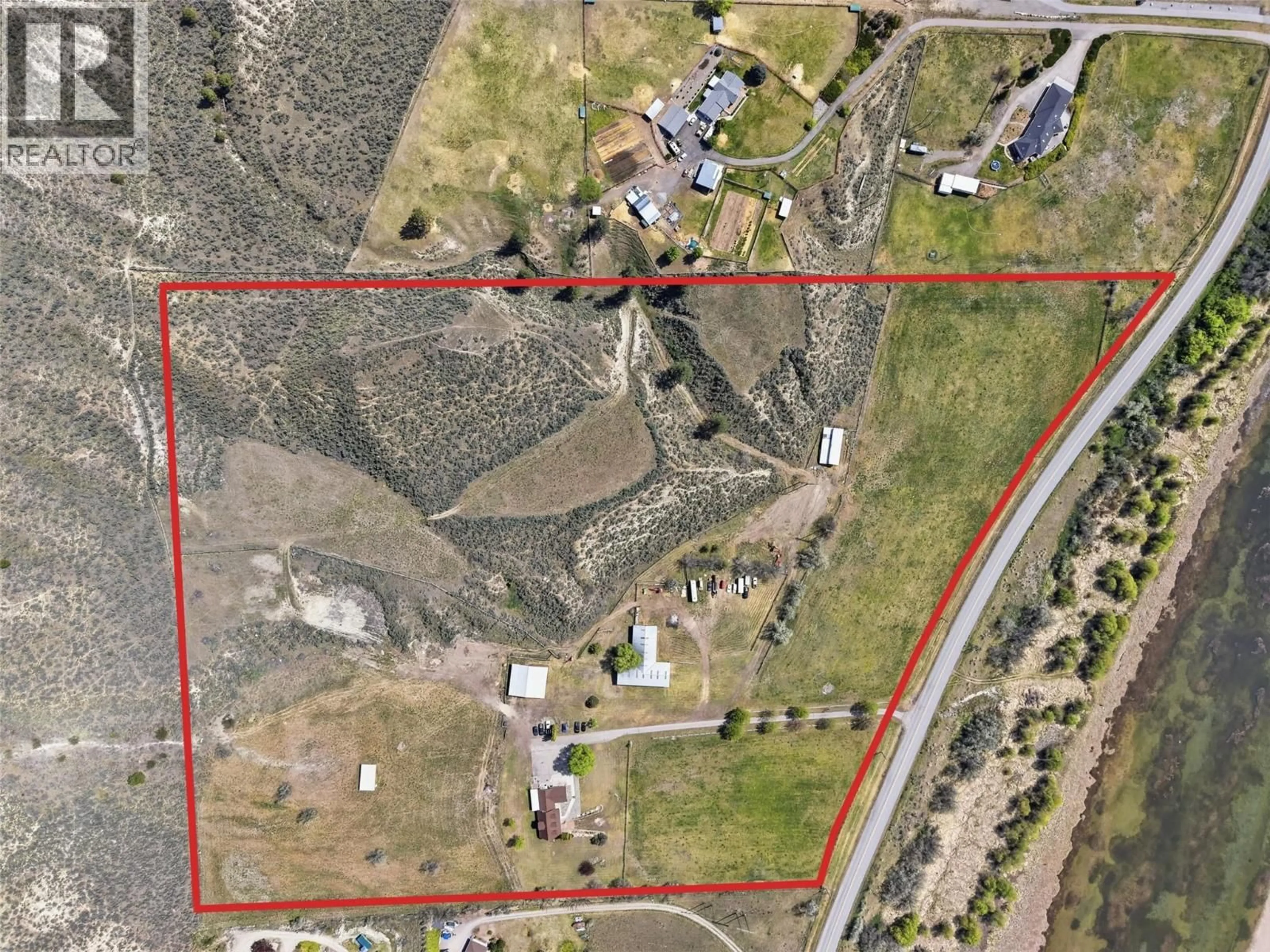A pic from outside/outdoor area/front of a property/back of a property/a pic from drone, building for 3335 SHUSWAP ROAD, Kamloops British Columbia V2H1T2