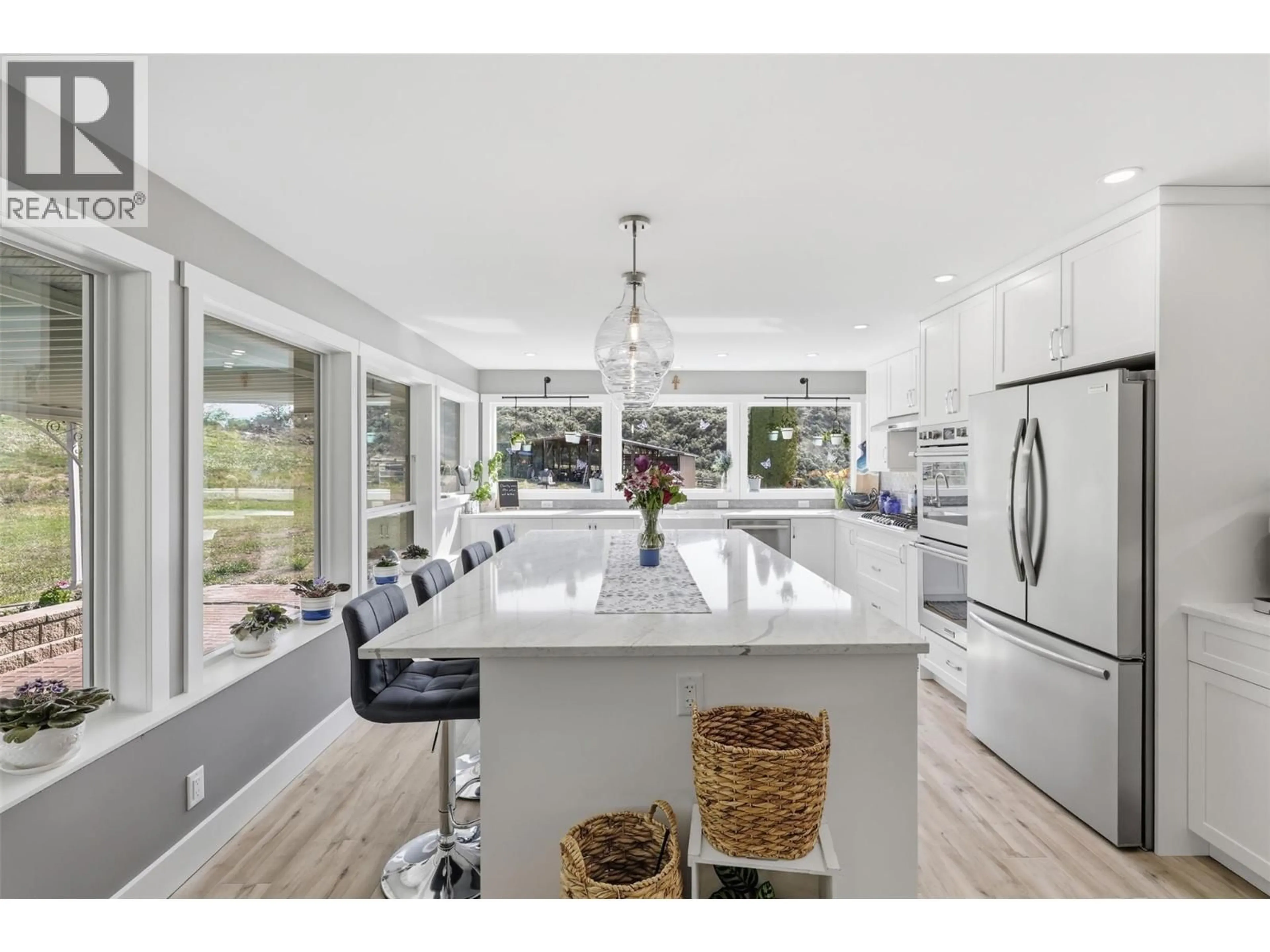Open concept kitchen, ceramic/tile floor for 3335 SHUSWAP ROAD, Kamloops British Columbia V2H1T2