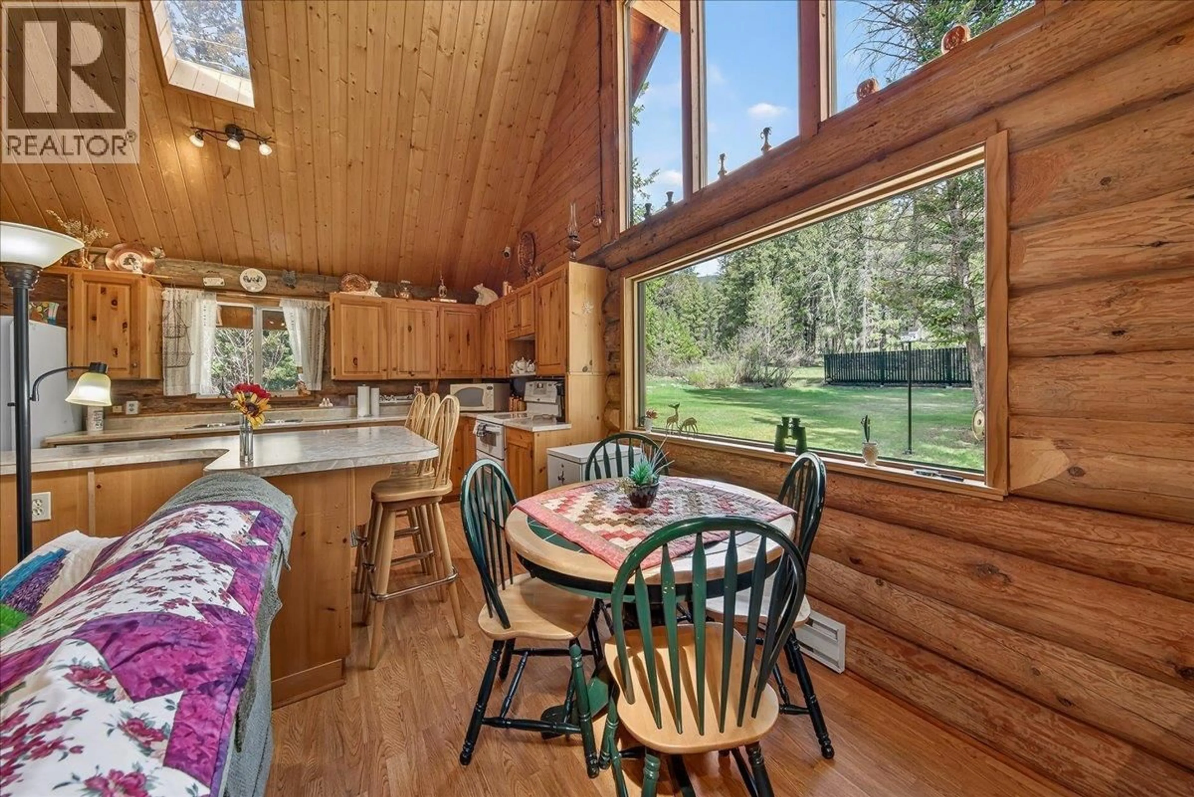 Dining room, wood/laminate floor for 4898 SABLE ROAD, Fairmont Hot Springs British Columbia V0B1L1