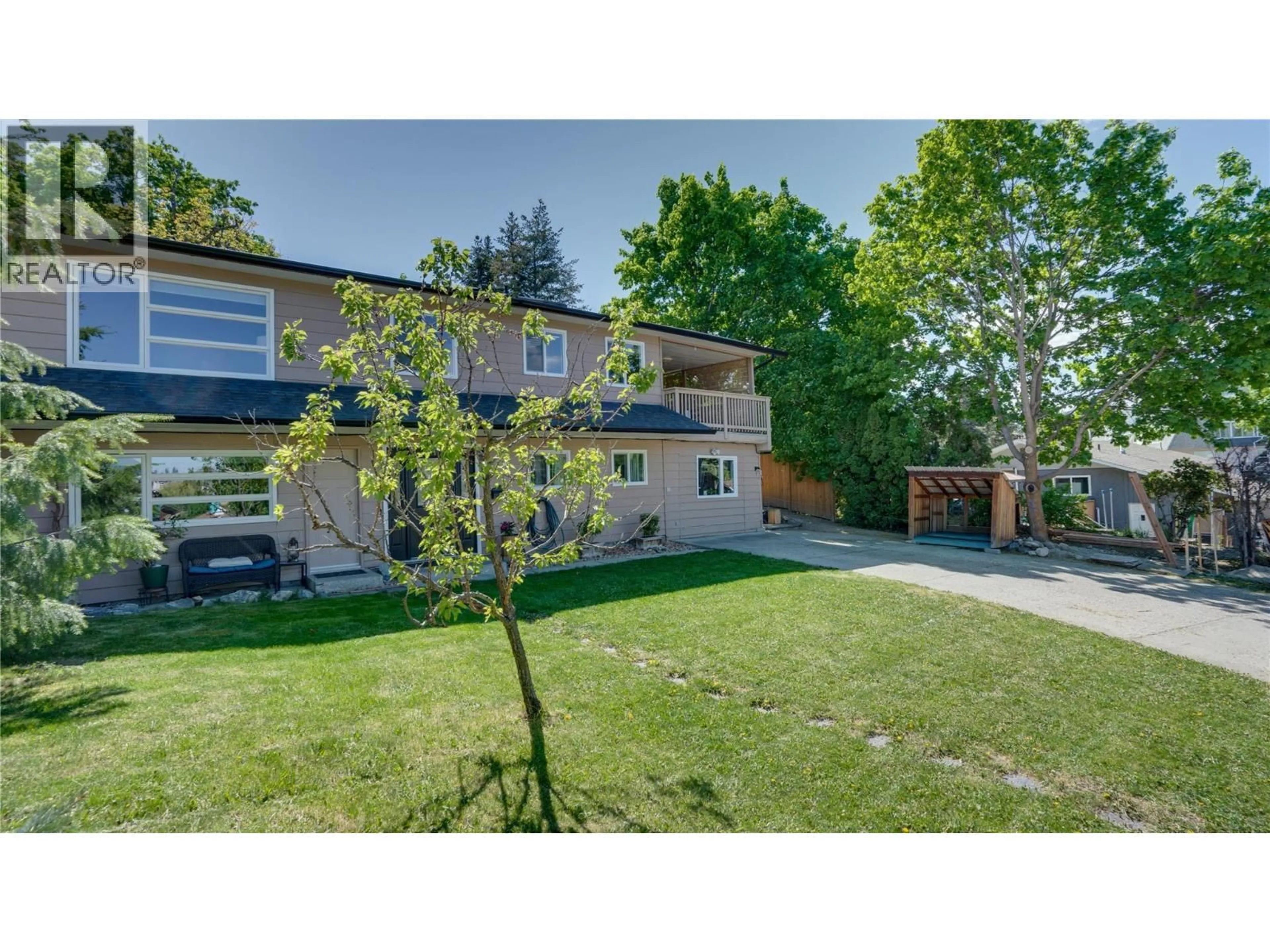 A pic from outside/outdoor area/front of a property/back of a property/a pic from drone, street for 2106 39 STREET, Vernon British Columbia V1T6W4
