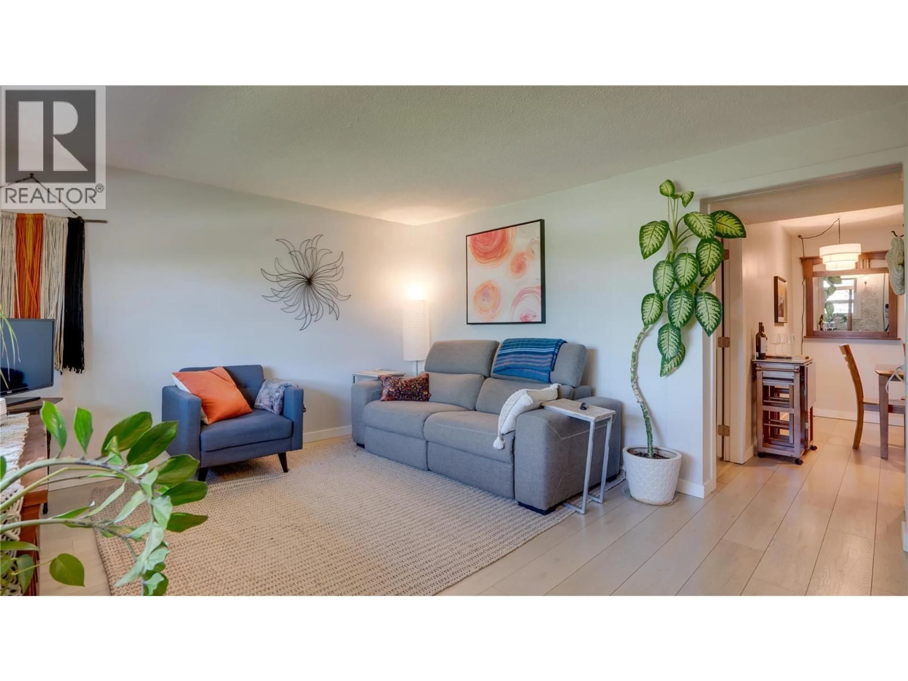 Living room with furniture, unknown for 2106 39 STREET, Vernon British Columbia V1T6W4