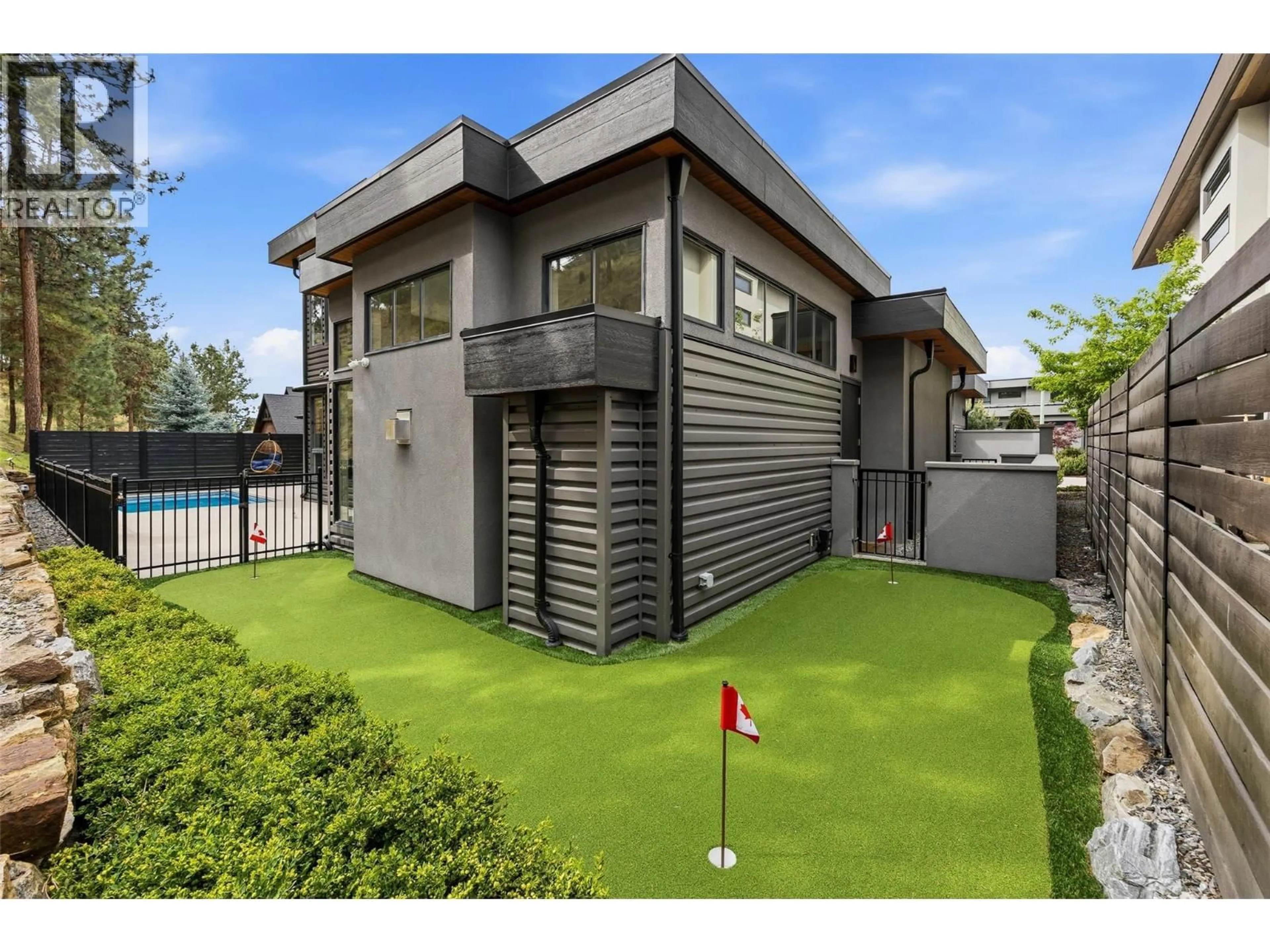 Home with vinyl exterior material, street for 1085 WESTPOINT DRIVE, Kelowna British Columbia V1W4Z9