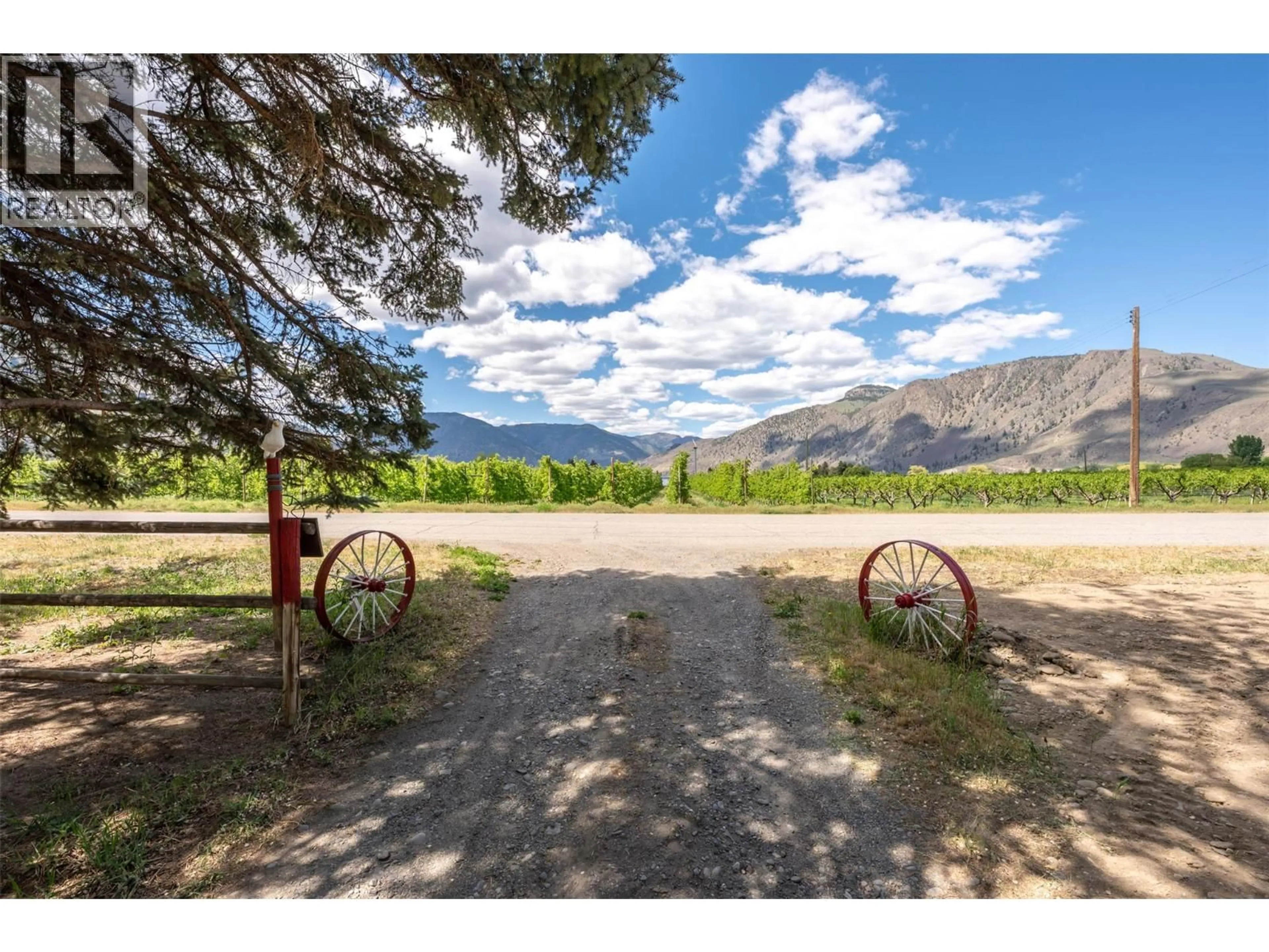 A pic from outside/outdoor area/front of a property/back of a property/a pic from drone, mountain view for 624 COULTHARD ROAD, Cawston British Columbia V0X1C2