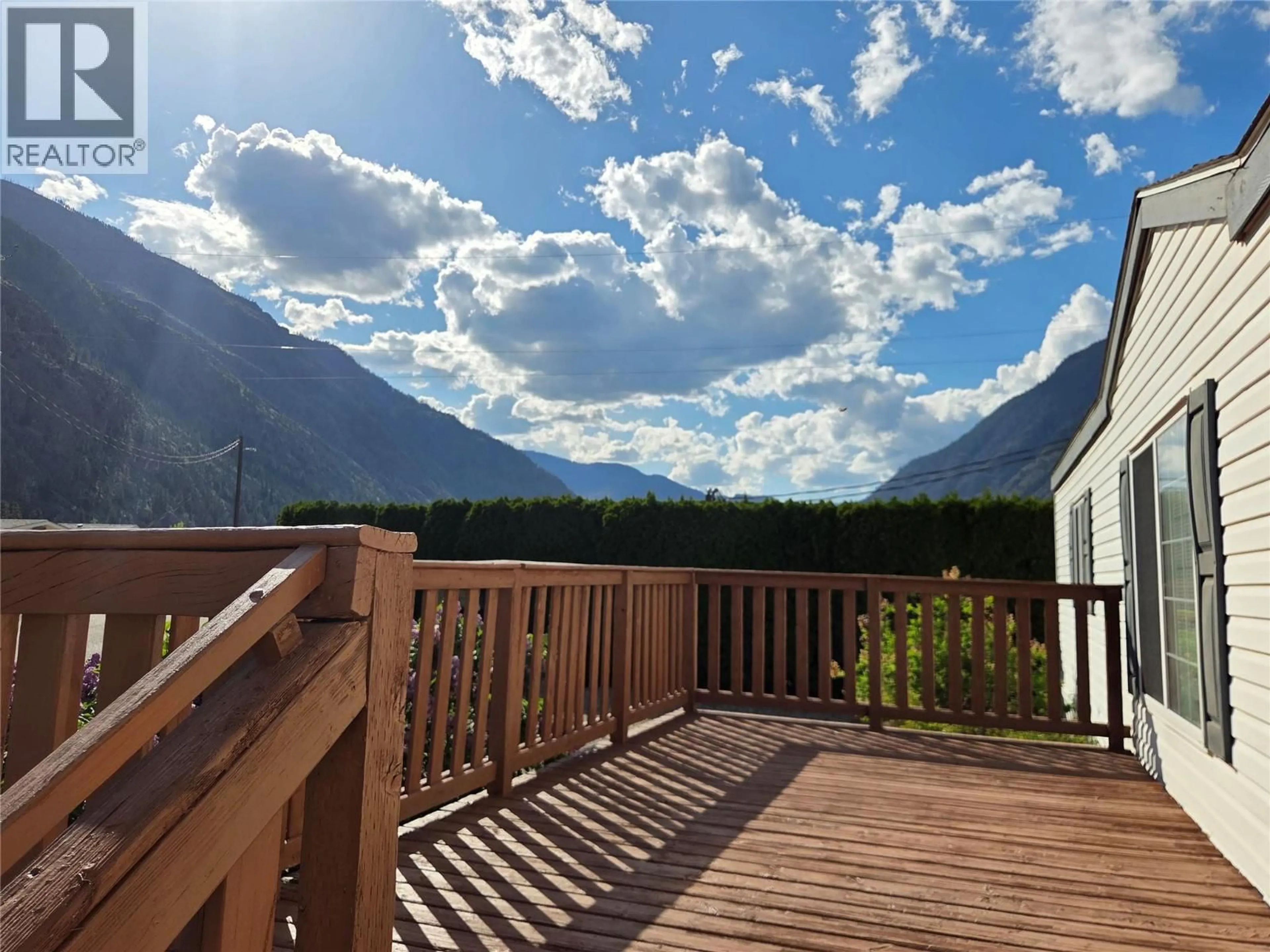A pic from outside/outdoor area/front of a property/back of a property/a pic from drone, mountain view for 5 - 3455 HIGHWAY 3 OTHER, Keremeos British Columbia V0X1N1