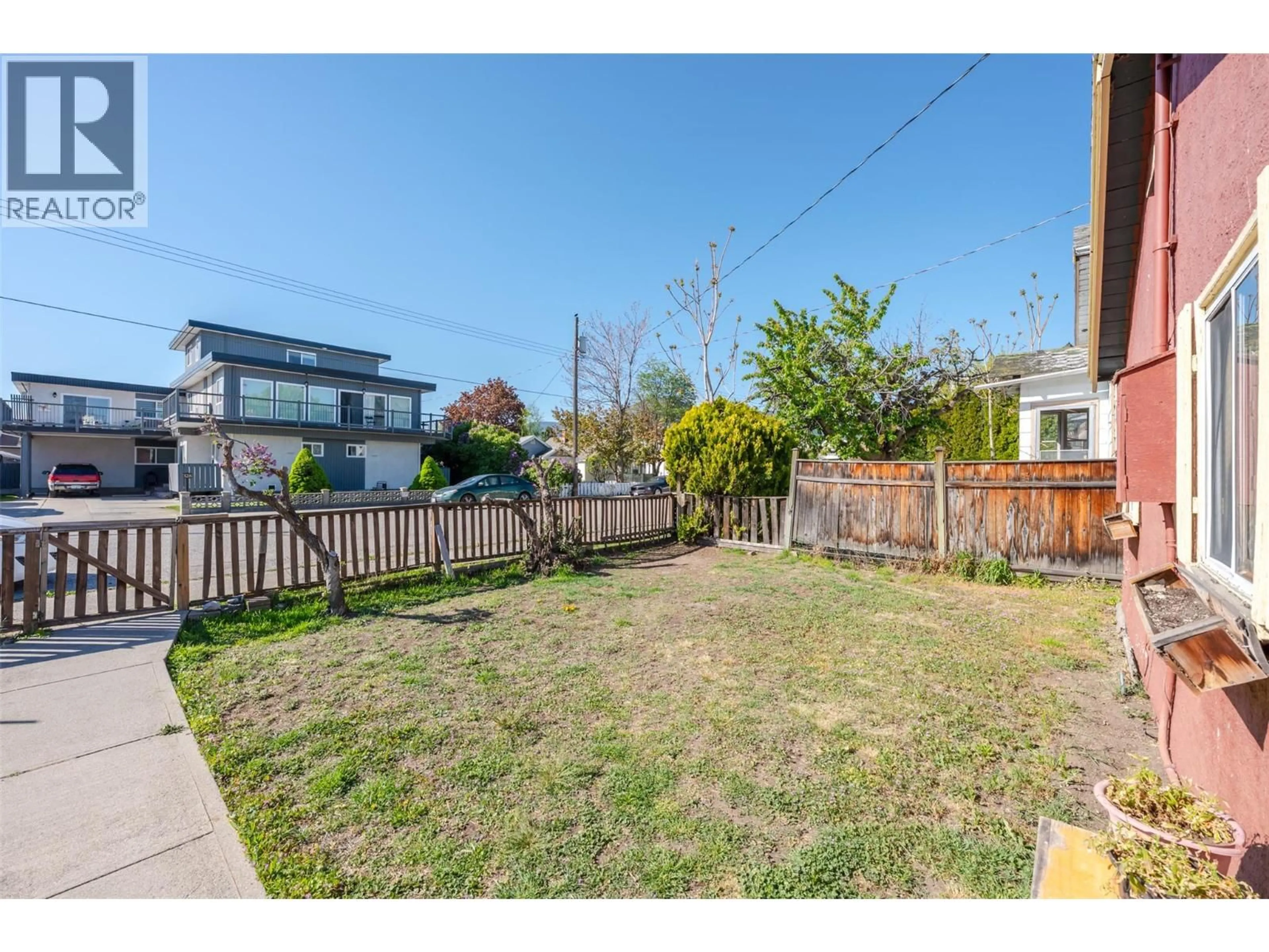 A pic from outside/outdoor area/front of a property/back of a property/a pic from drone, street for 329 NANAIMO AVENUE WEST, Penticton British Columbia V2A1N8