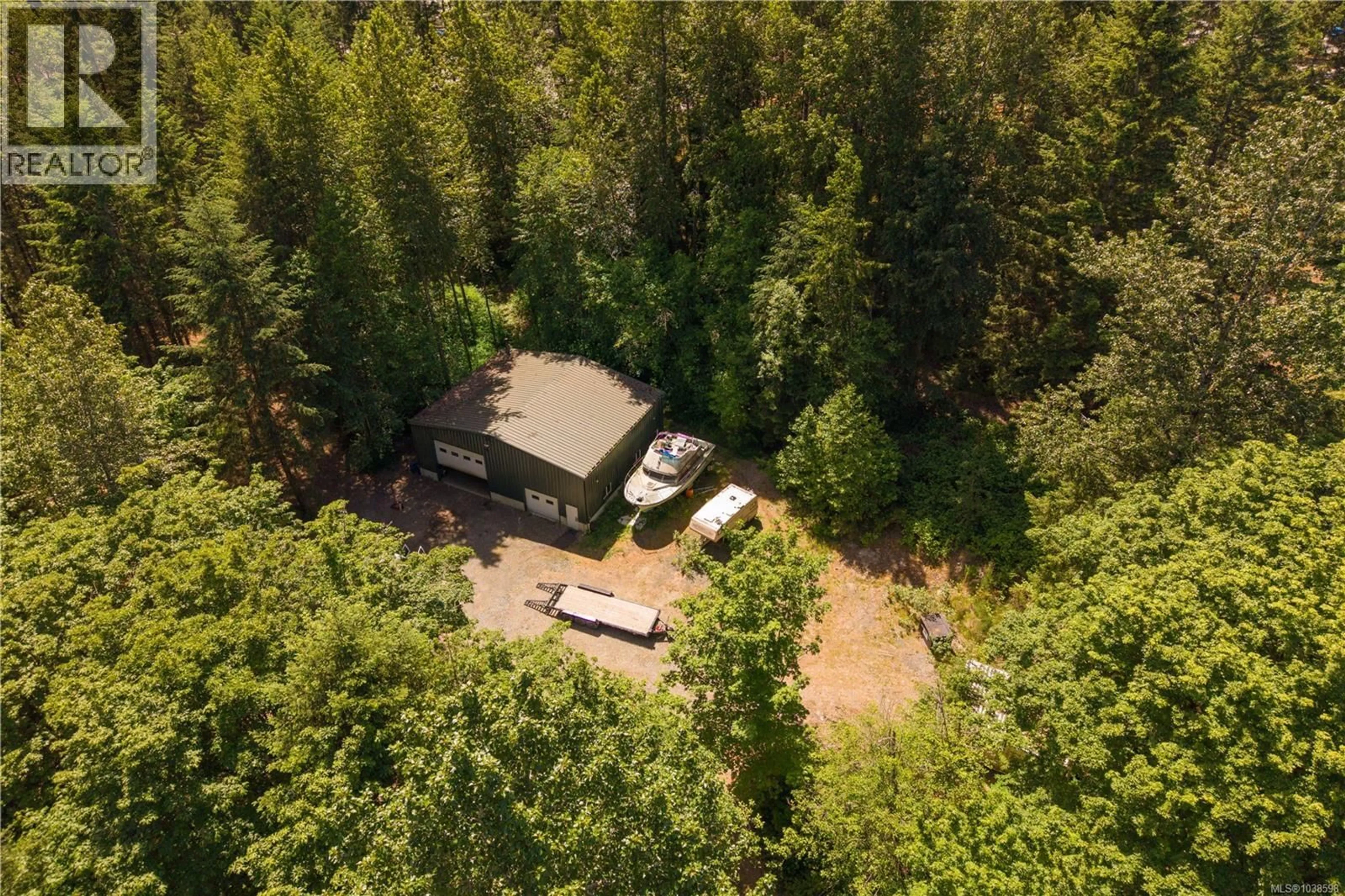 A pic from outside/outdoor area/front of a property/back of a property/a pic from drone, forest/trees view for 1880 FOREST HILL PLACE, Nanaimo British Columbia V9X1T2