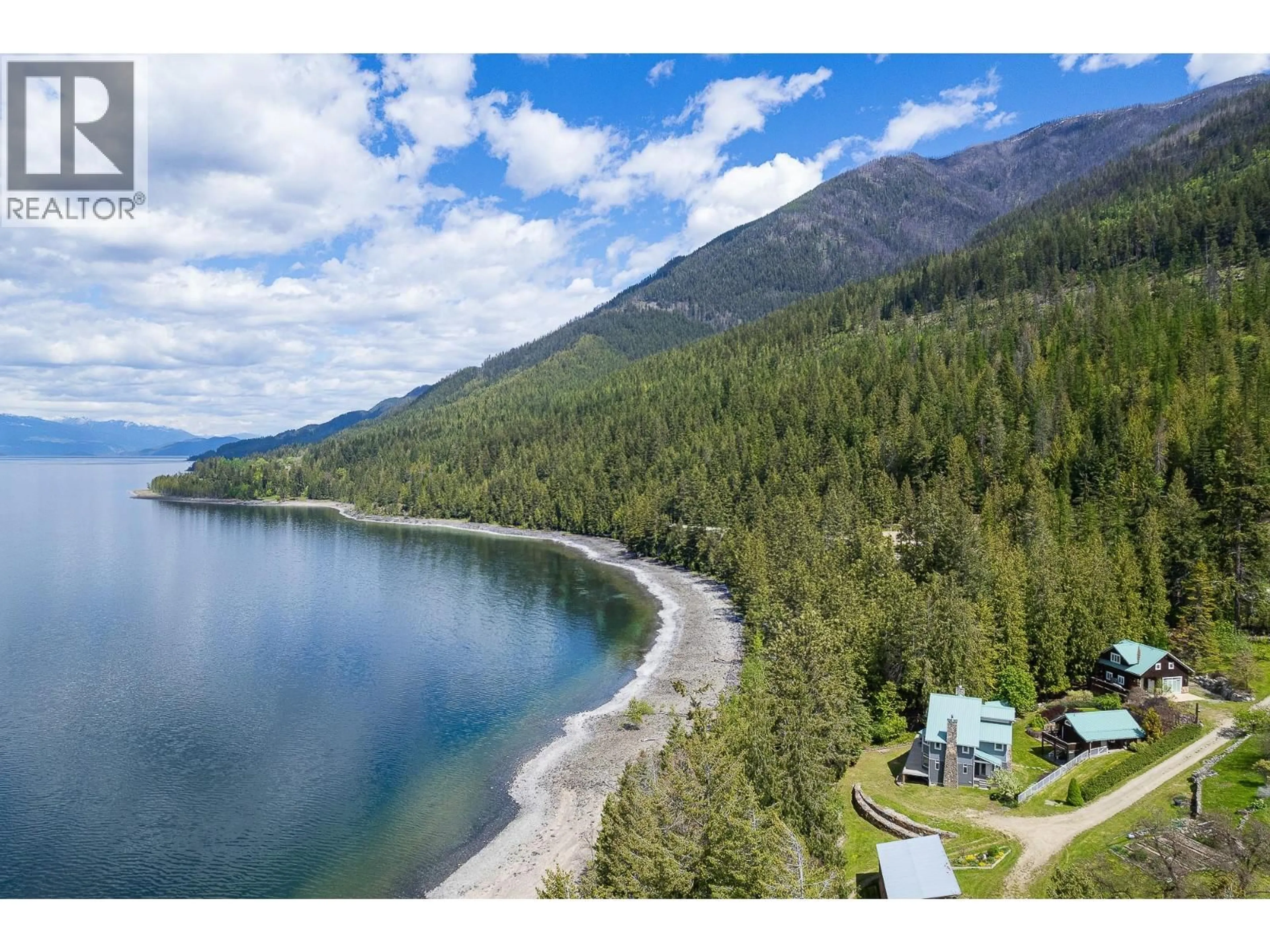 A pic from outside/outdoor area/front of a property/back of a property/a pic from drone, water/lake/river/ocean view for 12035 3A HIGHWAY, Boswell British Columbia V0B1A3