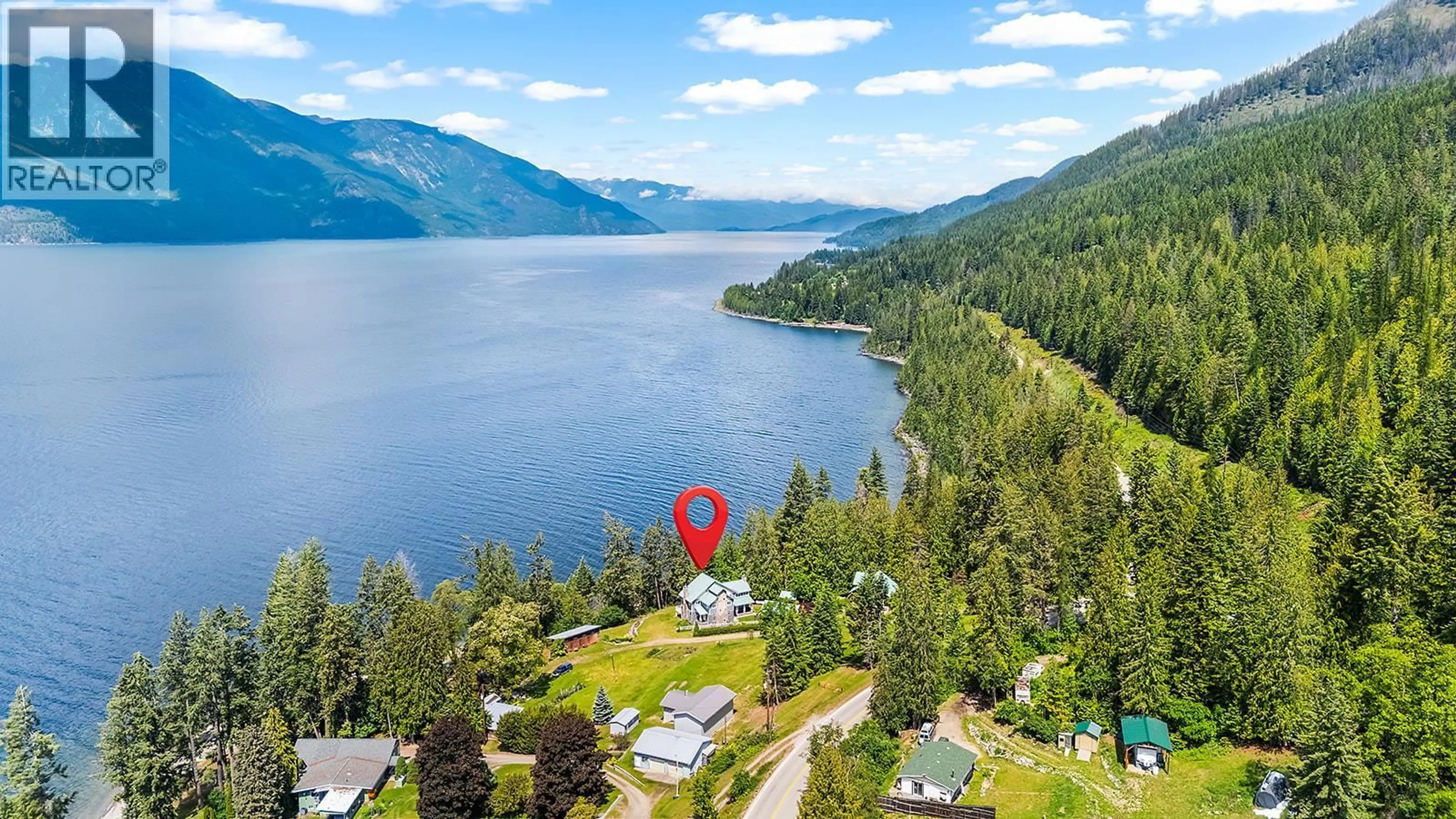 A pic from outside/outdoor area/front of a property/back of a property/a pic from drone, water/lake/river/ocean view for 12035 3A HIGHWAY, Boswell British Columbia V0B1A3