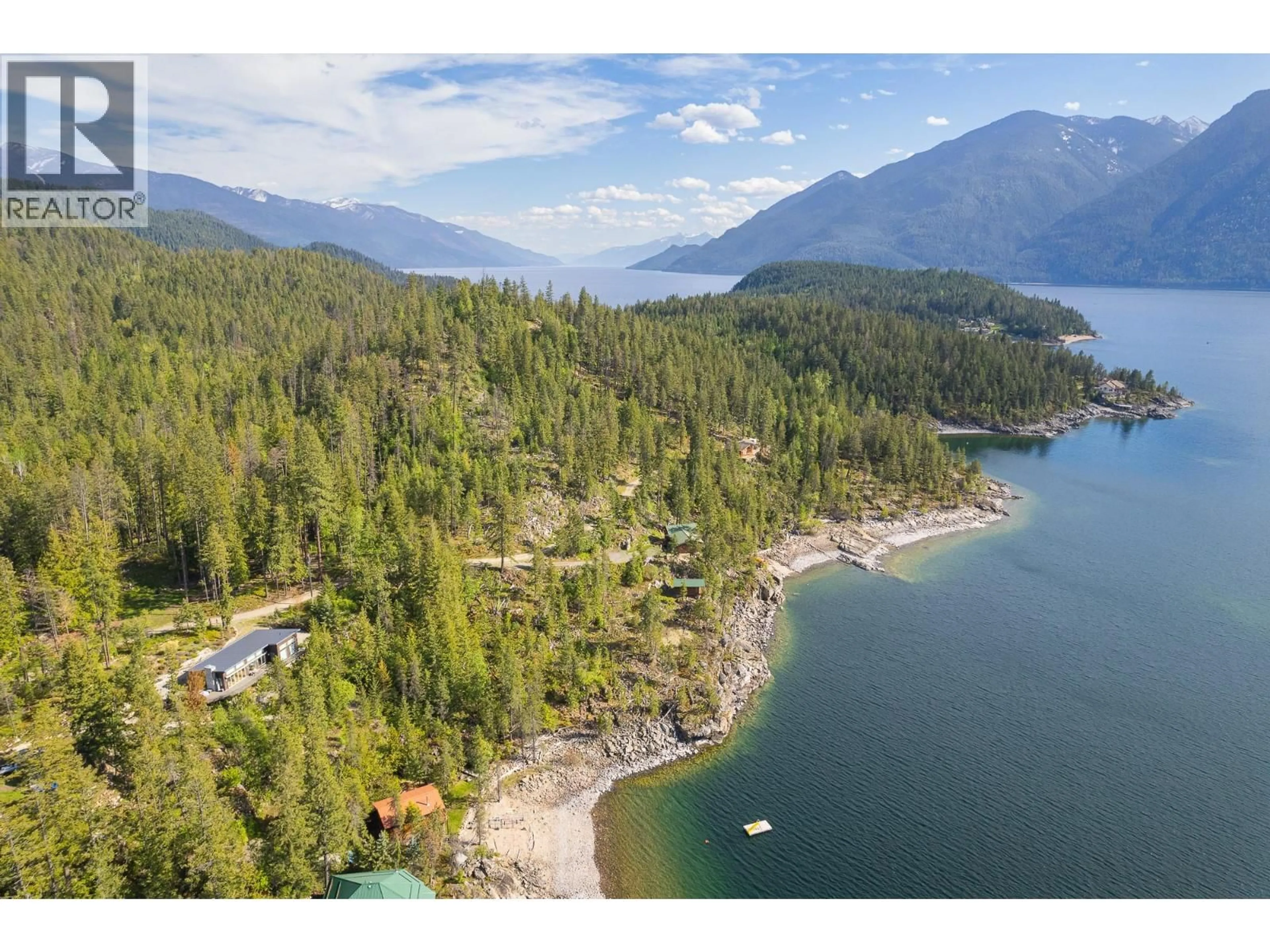 A pic from outside/outdoor area/front of a property/back of a property/a pic from drone, water/lake/river/ocean view for 17246 PILOT BAY ROAD, Crawford Bay British Columbia V0B1X0
