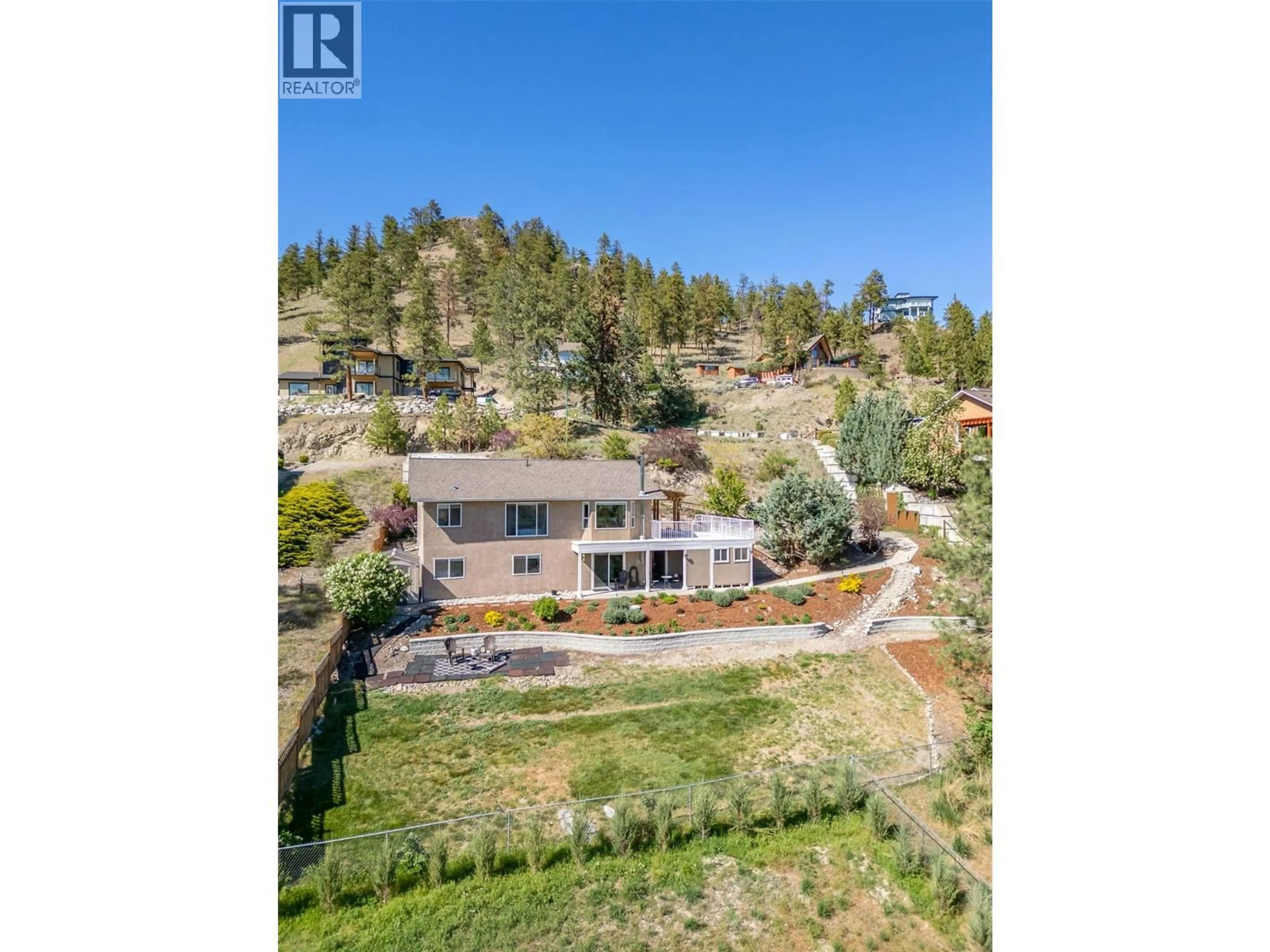 A pic from outside/outdoor area/front of a property/back of a property/a pic from drone, water/lake/river/ocean view for 13424 HERMISTON DRIVE, Summerland British Columbia V0H1Z8