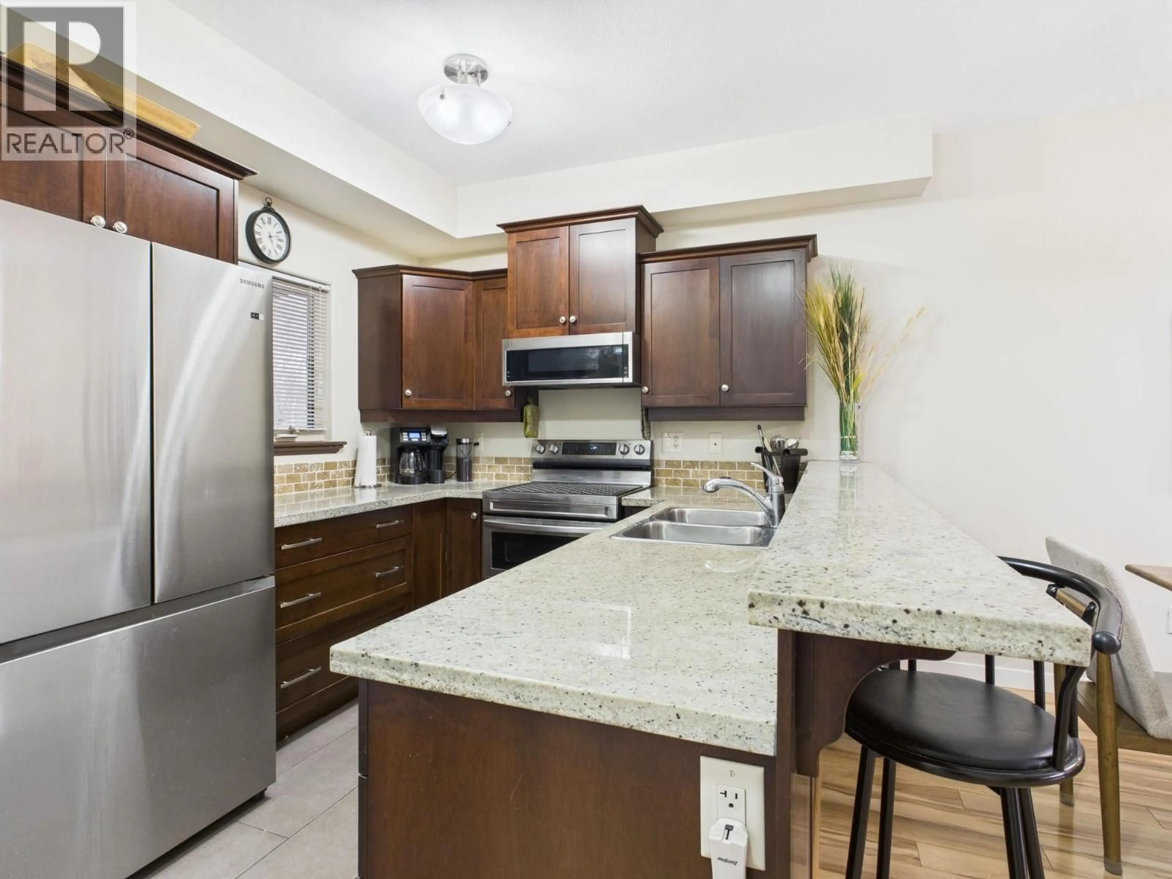 Open concept kitchen, ceramic/tile floor for 114 - 4300 44TH AVENUE, Osoyoos British Columbia V0H1V6
