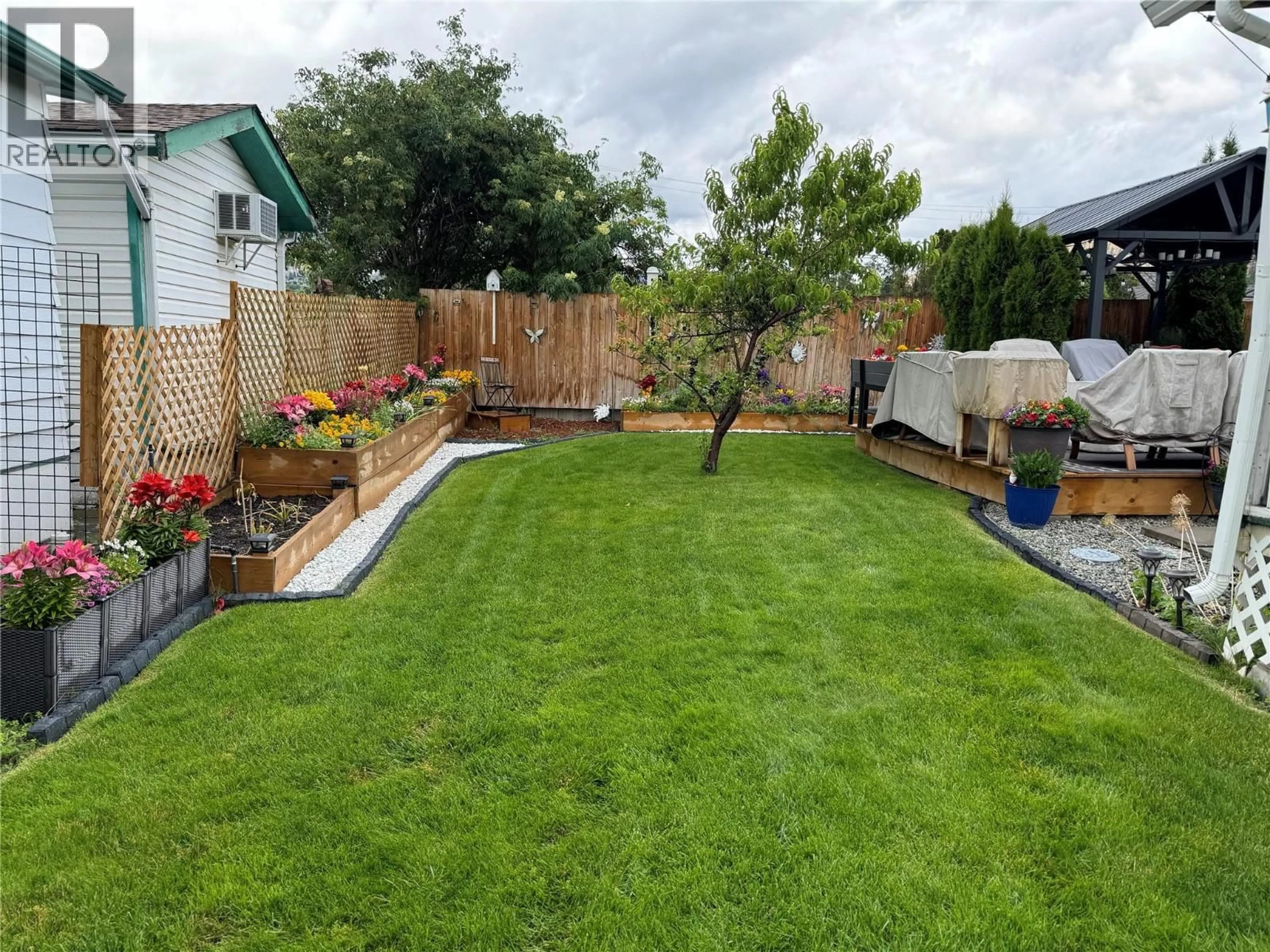 A pic from outside/outdoor area/front of a property/back of a property/a pic from drone, unknown for 159 - 1880 OLD BOUCHERIE ROAD, West Kelowna British Columbia V4T1Z3