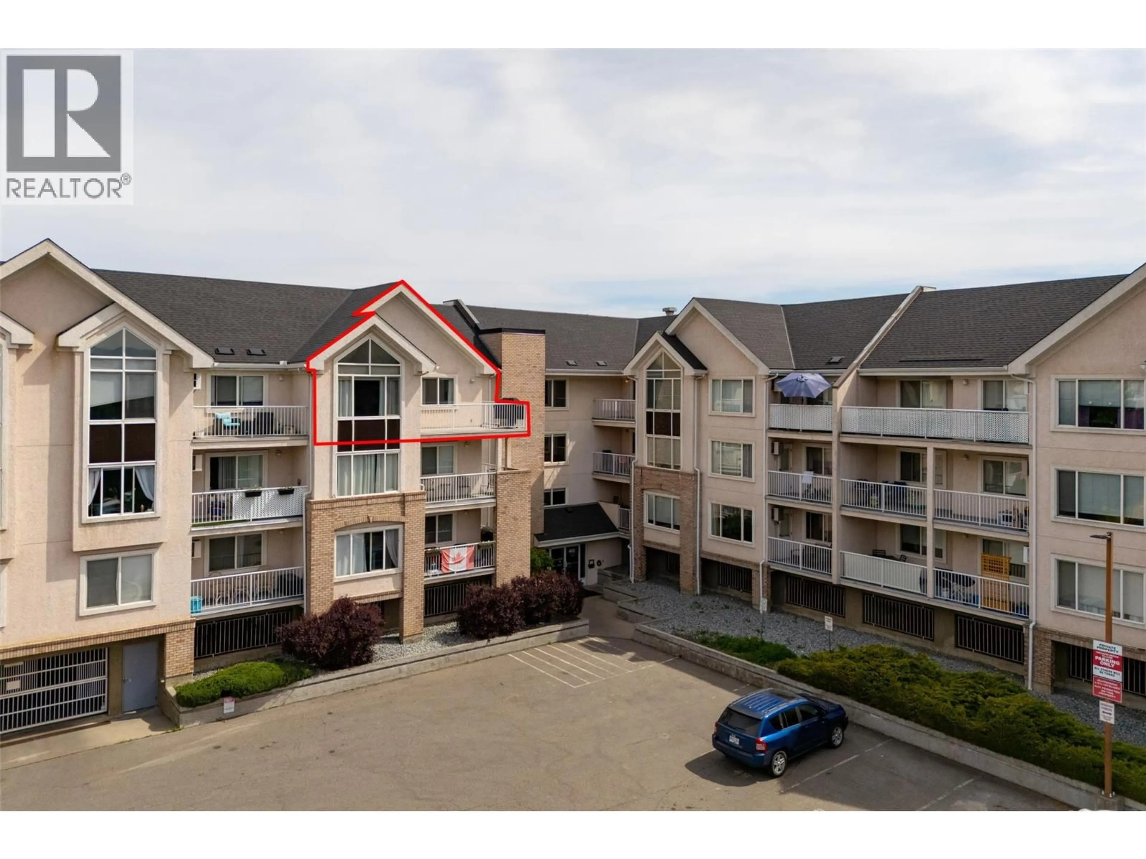 A pic from outside/outdoor area/front of a property/back of a property/a pic from drone, unknown for 313 - 400 SUTTON CRESCENT, Kelowna British Columbia V1V1Y3