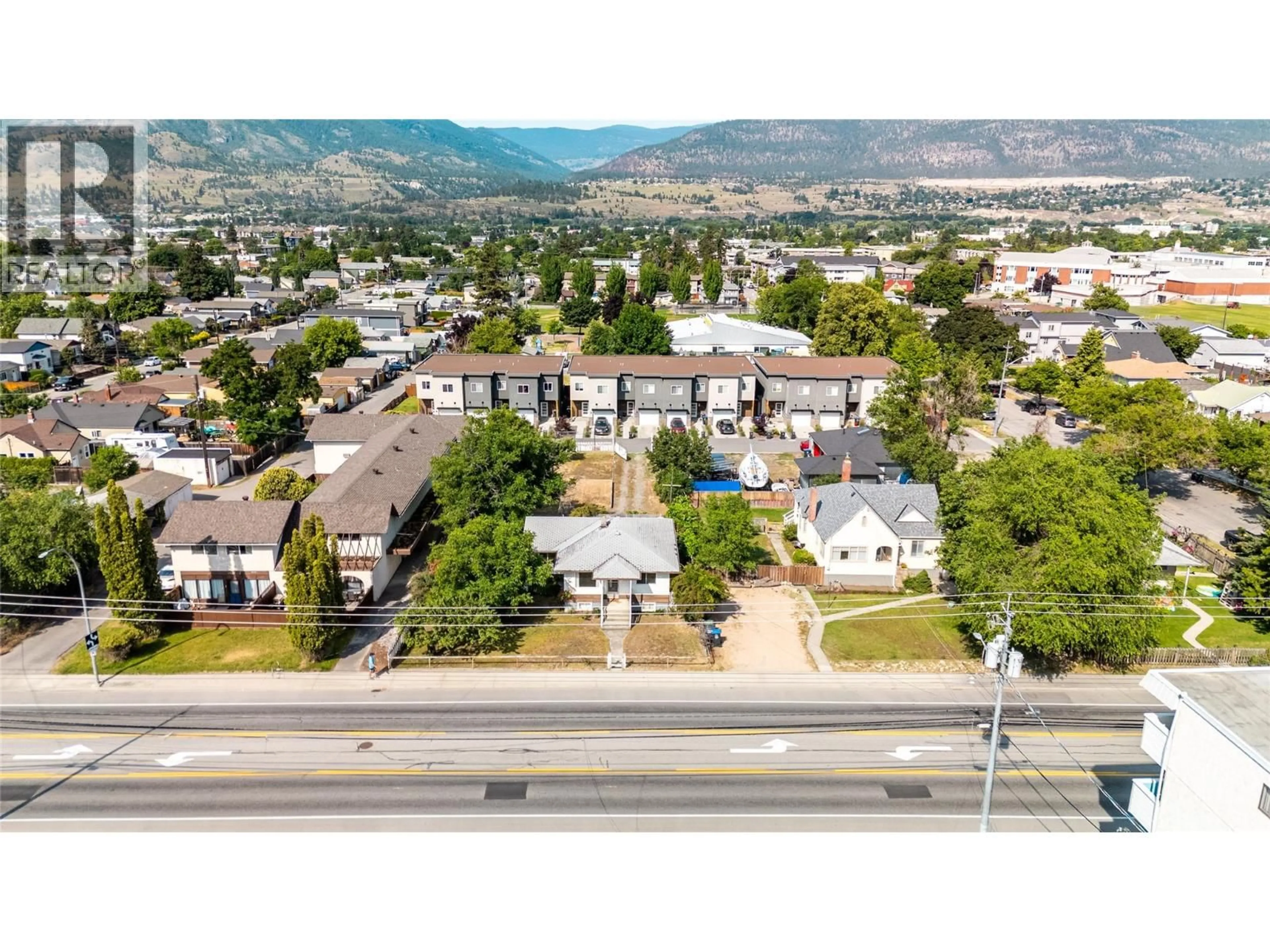 A pic from outside/outdoor area/front of a property/back of a property/a pic from drone, mountain view for 1049 GOVERNMENT STREET, Penticton British Columbia V2A4T9