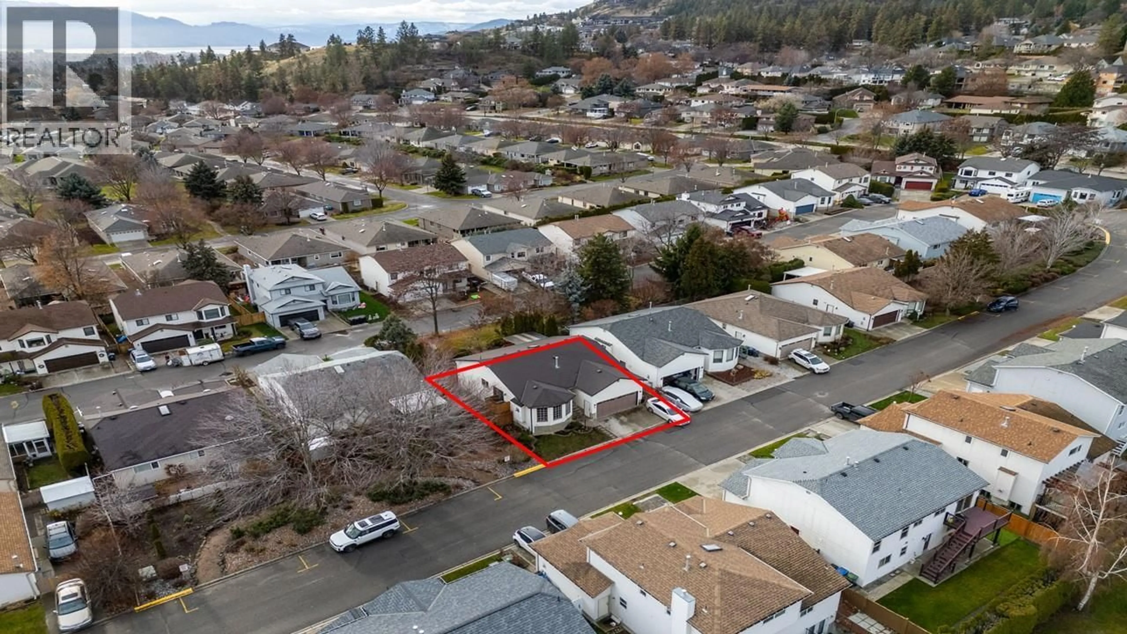 A pic from outside/outdoor area/front of a property/back of a property/a pic from drone, street for 38 - 555 GLENMEADOWS ROAD, Kelowna British Columbia V1V1V5