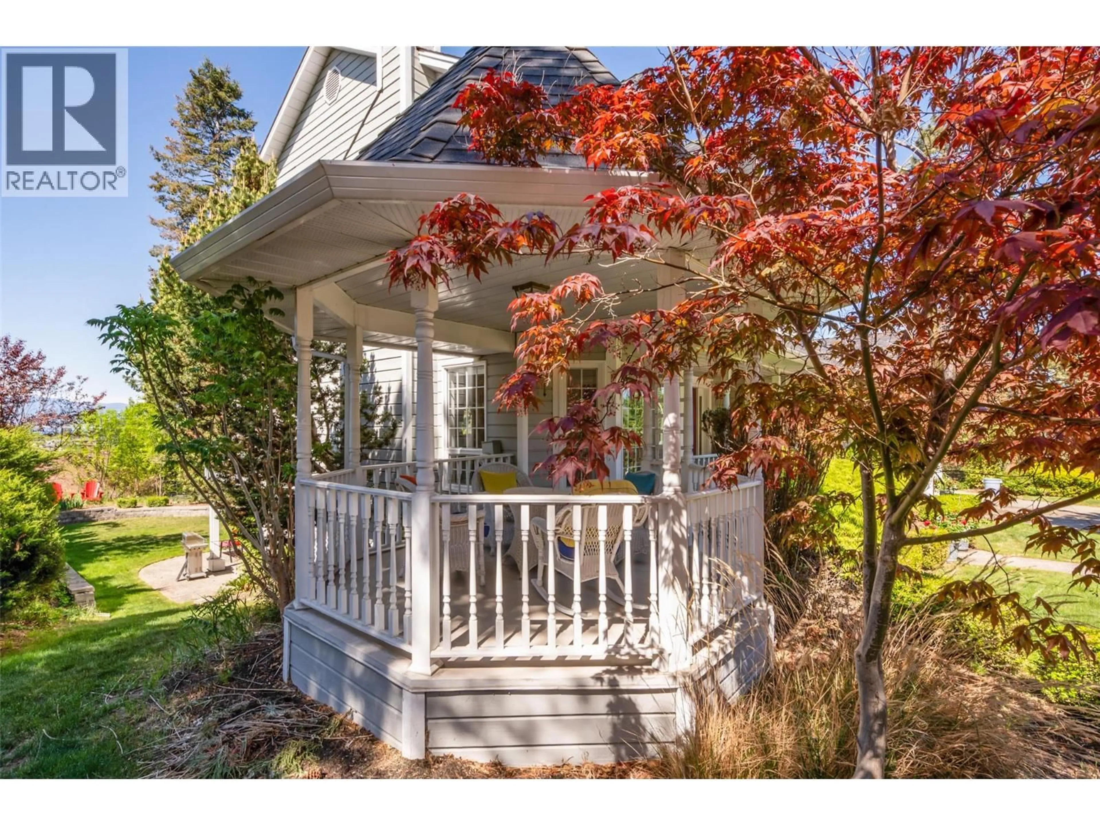 Home with vinyl exterior material, street for 741 WESTPOINT DRIVE, Kelowna British Columbia V1W2Z4