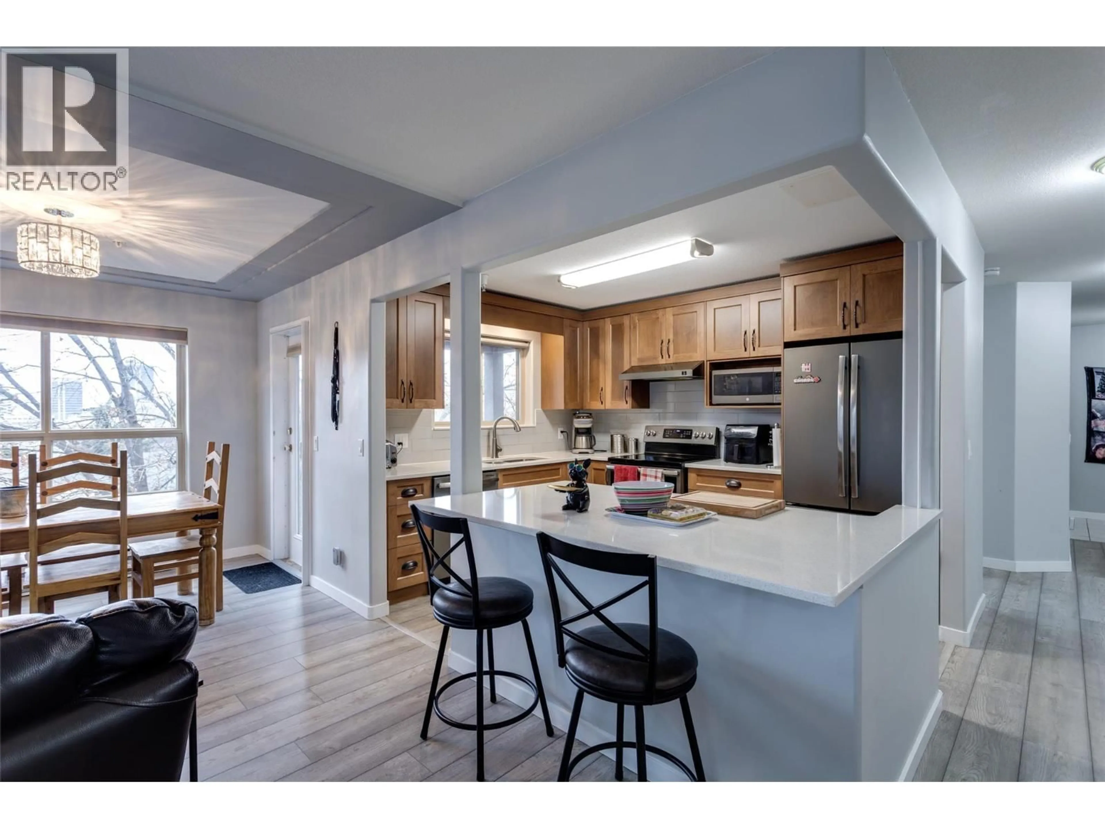 Open concept kitchen, unknown for 302 - 2130 VASILE ROAD, Kelowna British Columbia V1Y6H5