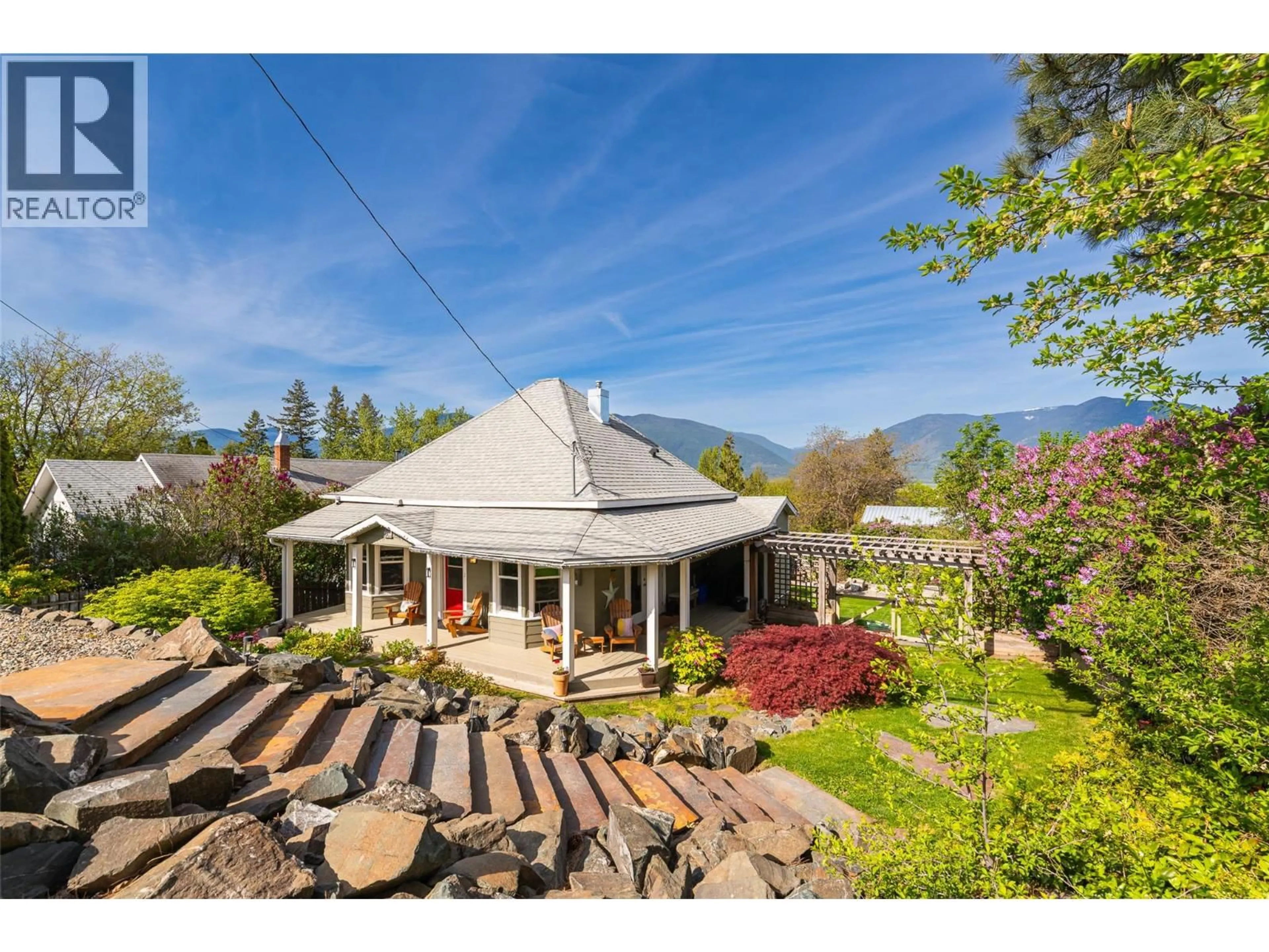 A pic from outside/outdoor area/front of a property/back of a property/a pic from drone, mountain view for 225 8TH AVENUE SOUTH, Creston British Columbia V0B1G3