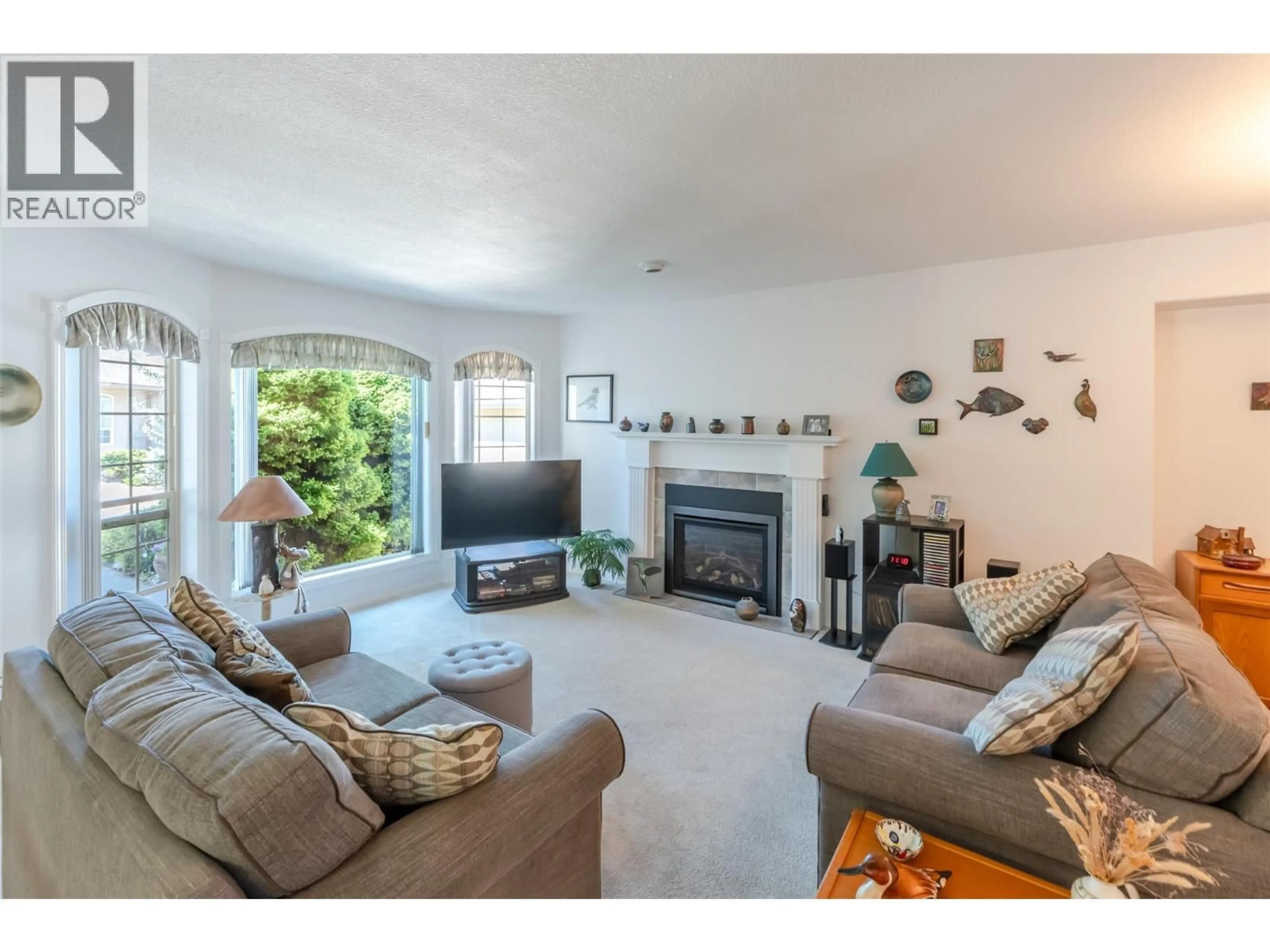 Living room with furniture, unknown for 105 - 1634 CARMI AVENUE, Penticton British Columbia V2A8K5