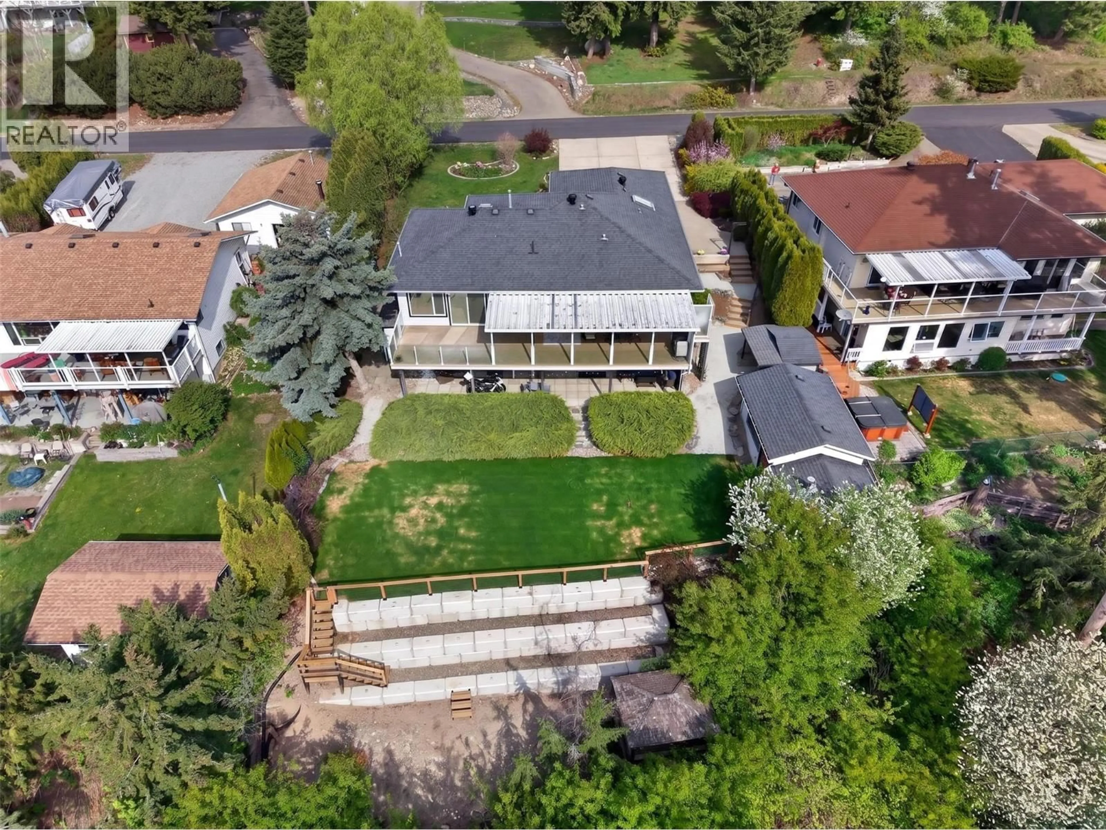 A pic from outside/outdoor area/front of a property/back of a property/a pic from drone, street for 3714 BASTIONVIEW ROAD, Tappen British Columbia V0E2X1
