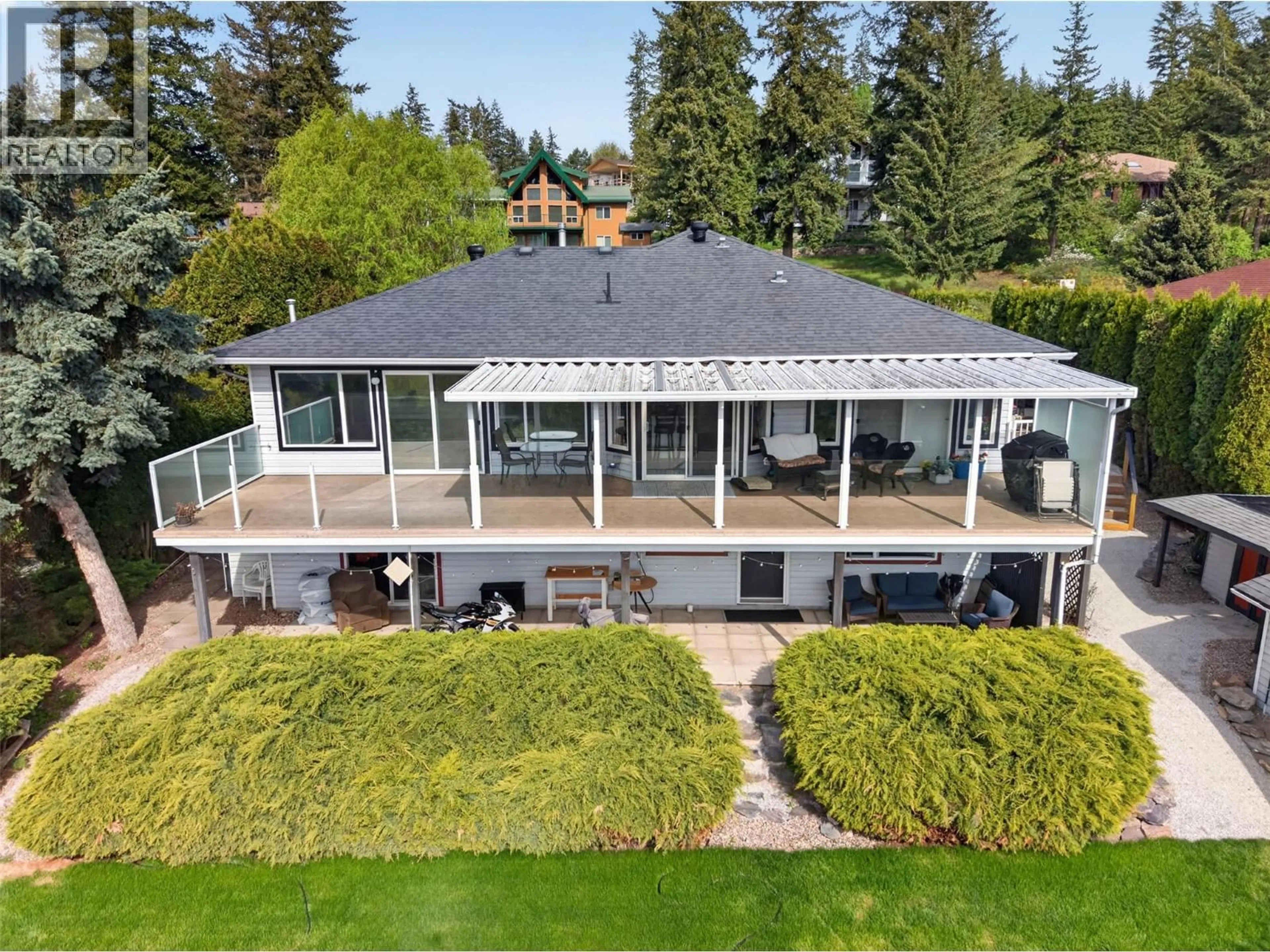 A pic from outside/outdoor area/front of a property/back of a property/a pic from drone, unknown for 3714 BASTIONVIEW ROAD, Tappen British Columbia V0E2X1