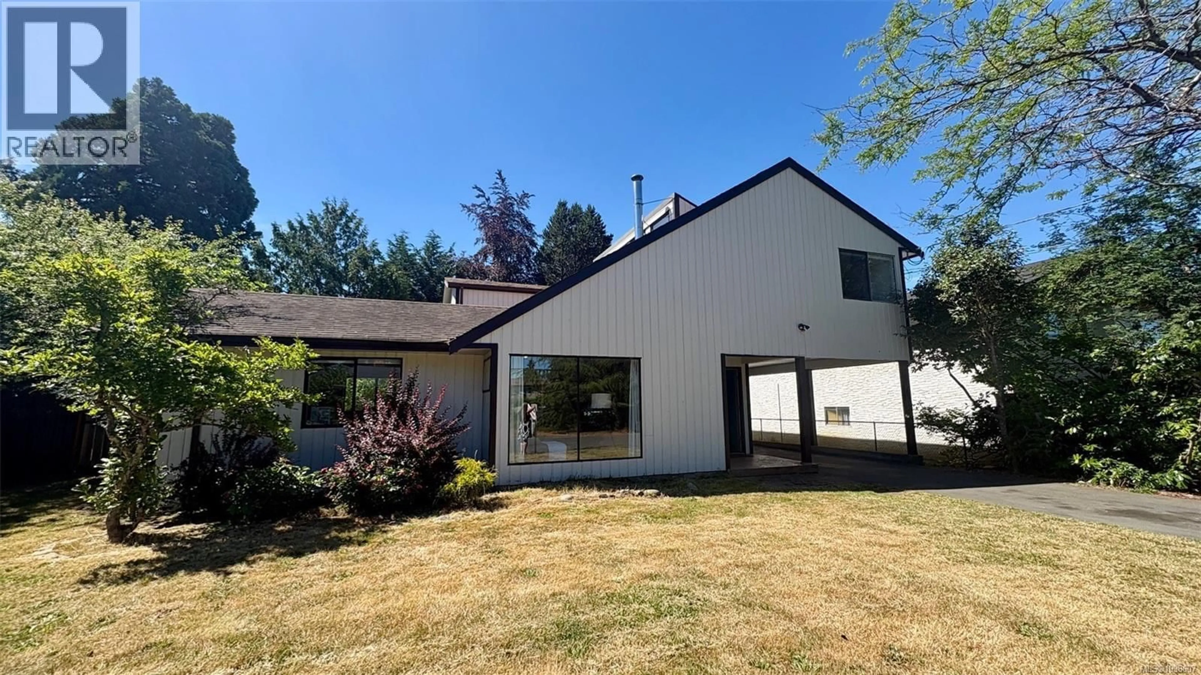 A pic from outside/outdoor area/front of a property/back of a property/a pic from drone, unknown for 1871 FAIRBURN DRIVE, Saanich British Columbia V8N5B4