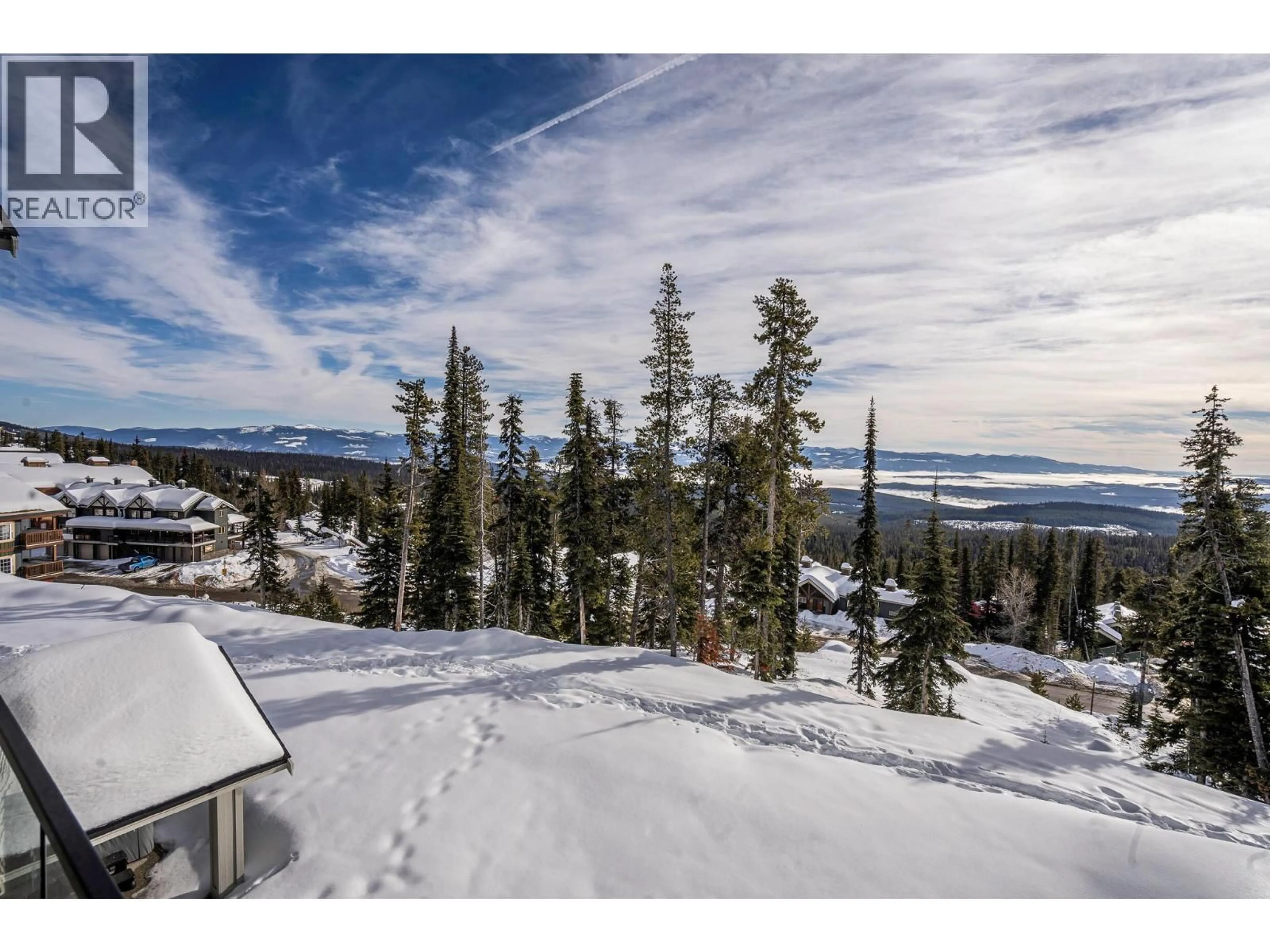 A pic from outside/outdoor area/front of a property/back of a property/a pic from drone, mountain view for 205 GRIZZLY RIDGE TRAIL, Big White British Columbia V1P1P4