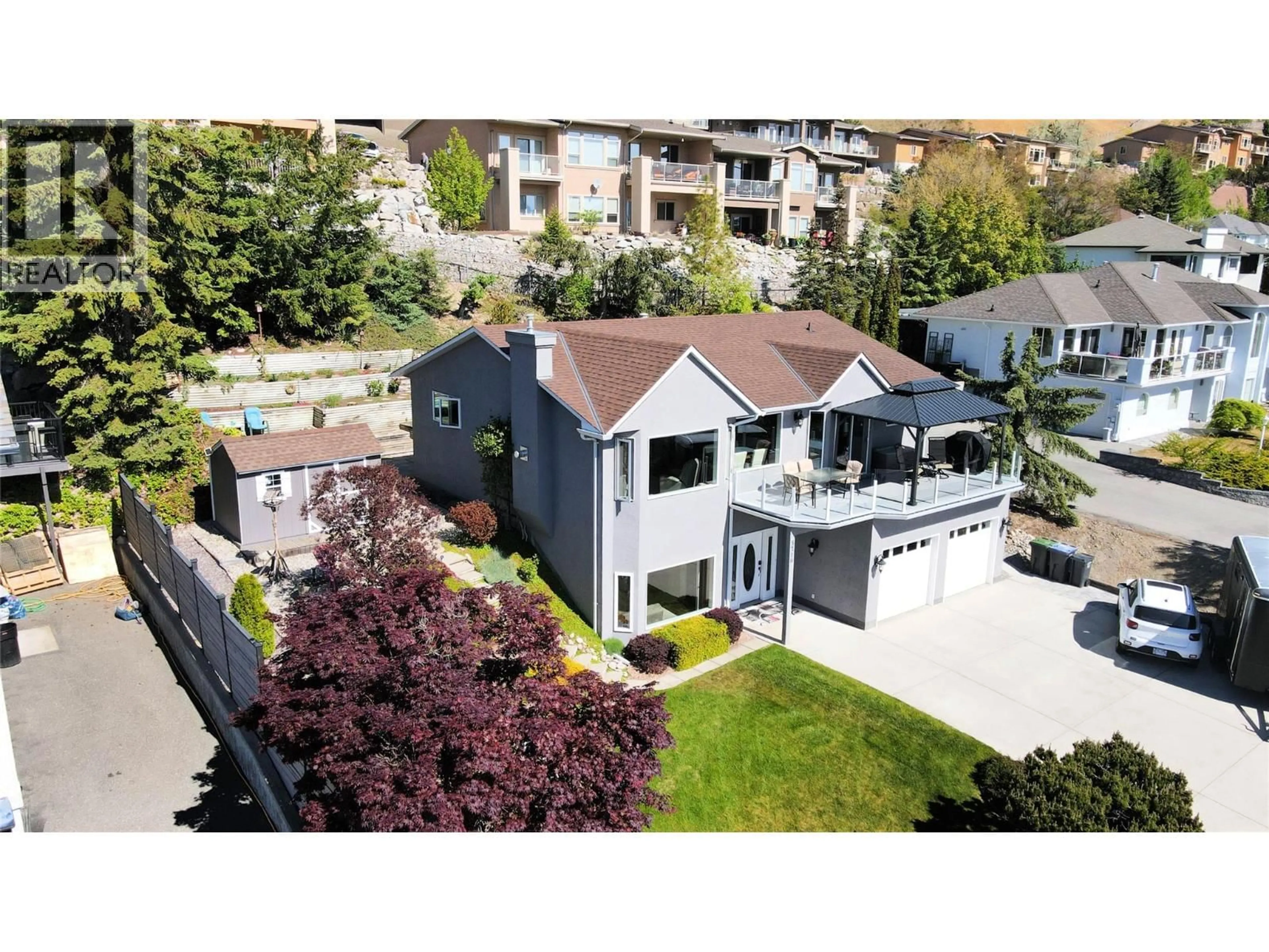 A pic from outside/outdoor area/front of a property/back of a property/a pic from drone, street for 5216 SUTHERLAND ROAD, Peachland British Columbia V0H1X2