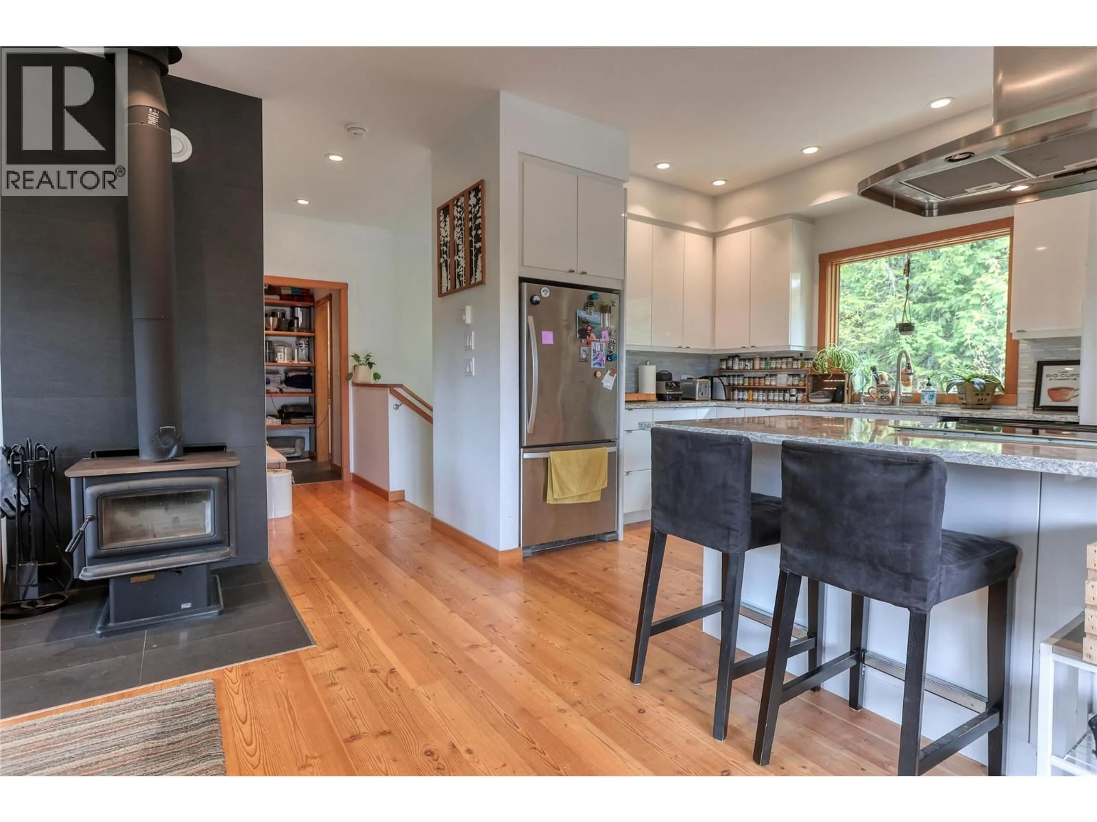 Open concept kitchen, wood/laminate floor for 3112 BLEWETT ROAD, Nelson British Columbia V1L6V5