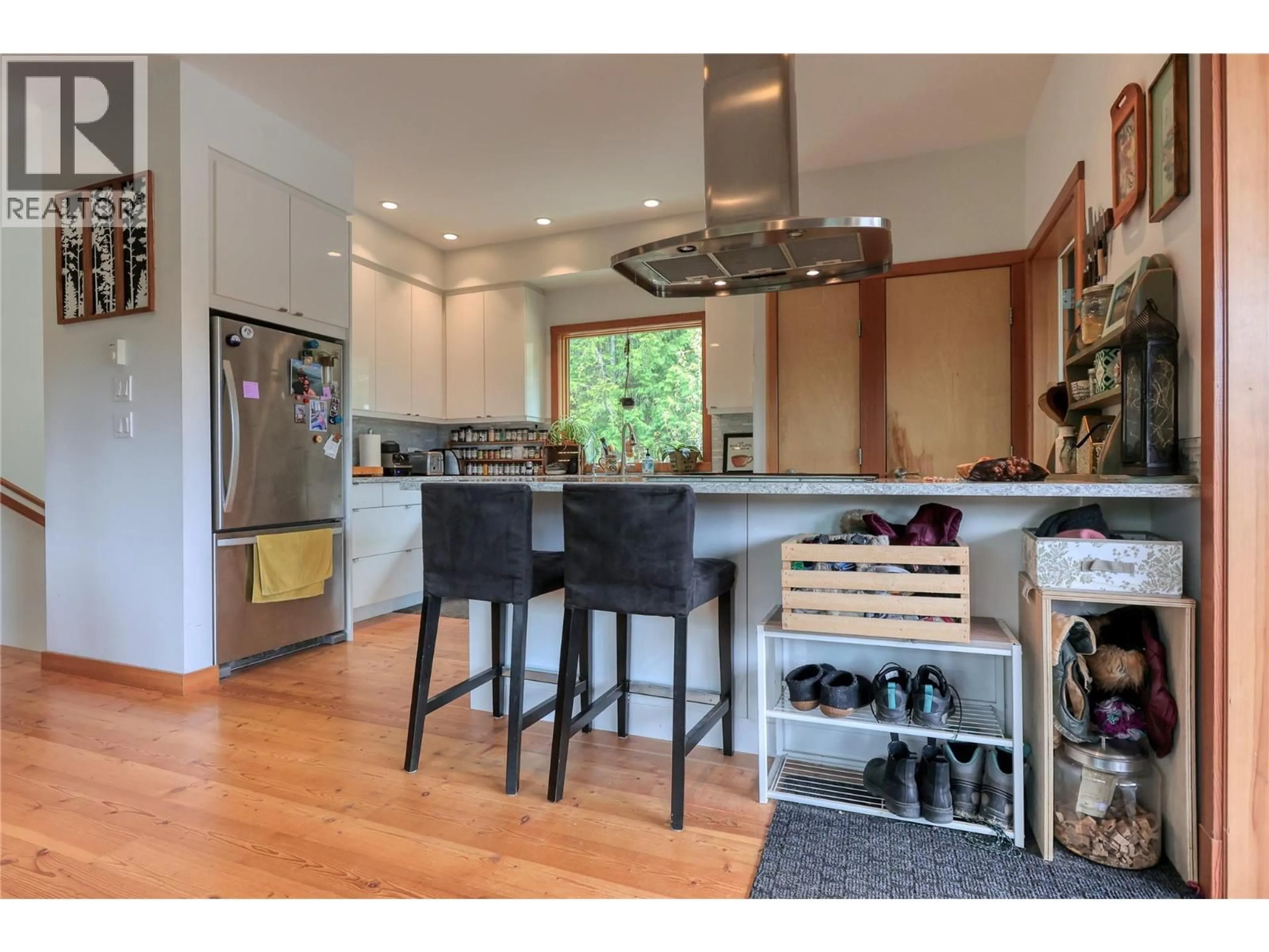Open concept kitchen, wood/laminate floor for 3112 BLEWETT ROAD, Nelson British Columbia V1L6V5