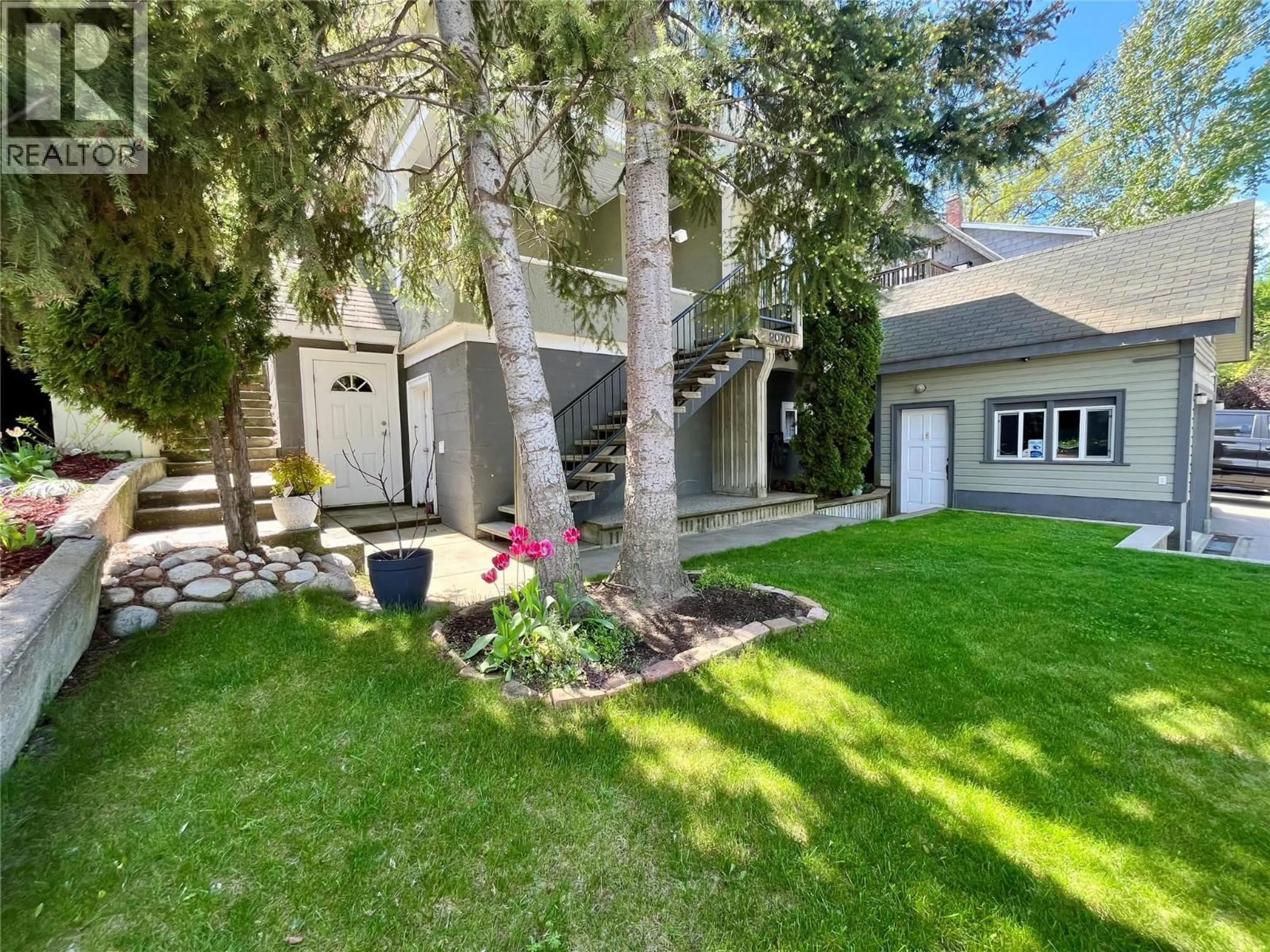 A pic from outside/outdoor area/front of a property/back of a property/a pic from drone, unknown for 2070 RIVERSIDE AVENUE, Trail British Columbia V1R3Z4