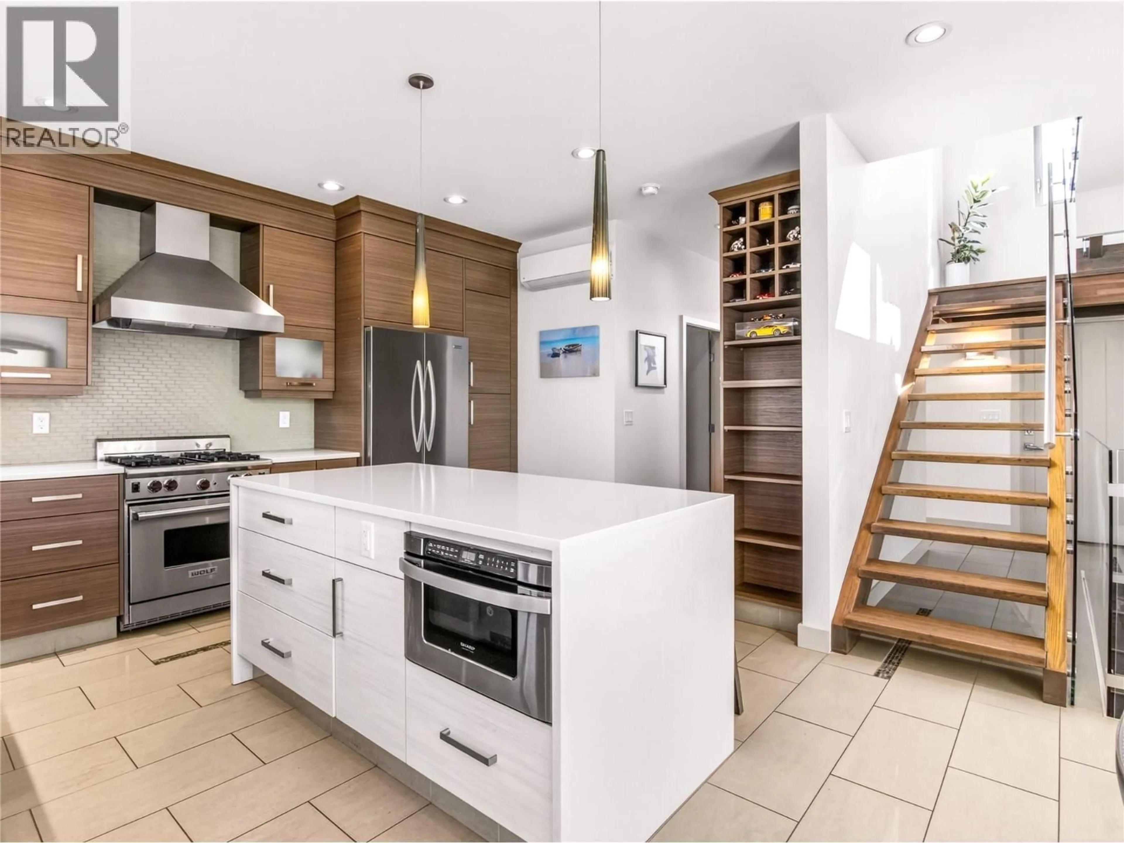 Contemporary kitchen, ceramic/tile floor for 101 - 433 CHURCHILL AVENUE, Penticton British Columbia V2A1C9