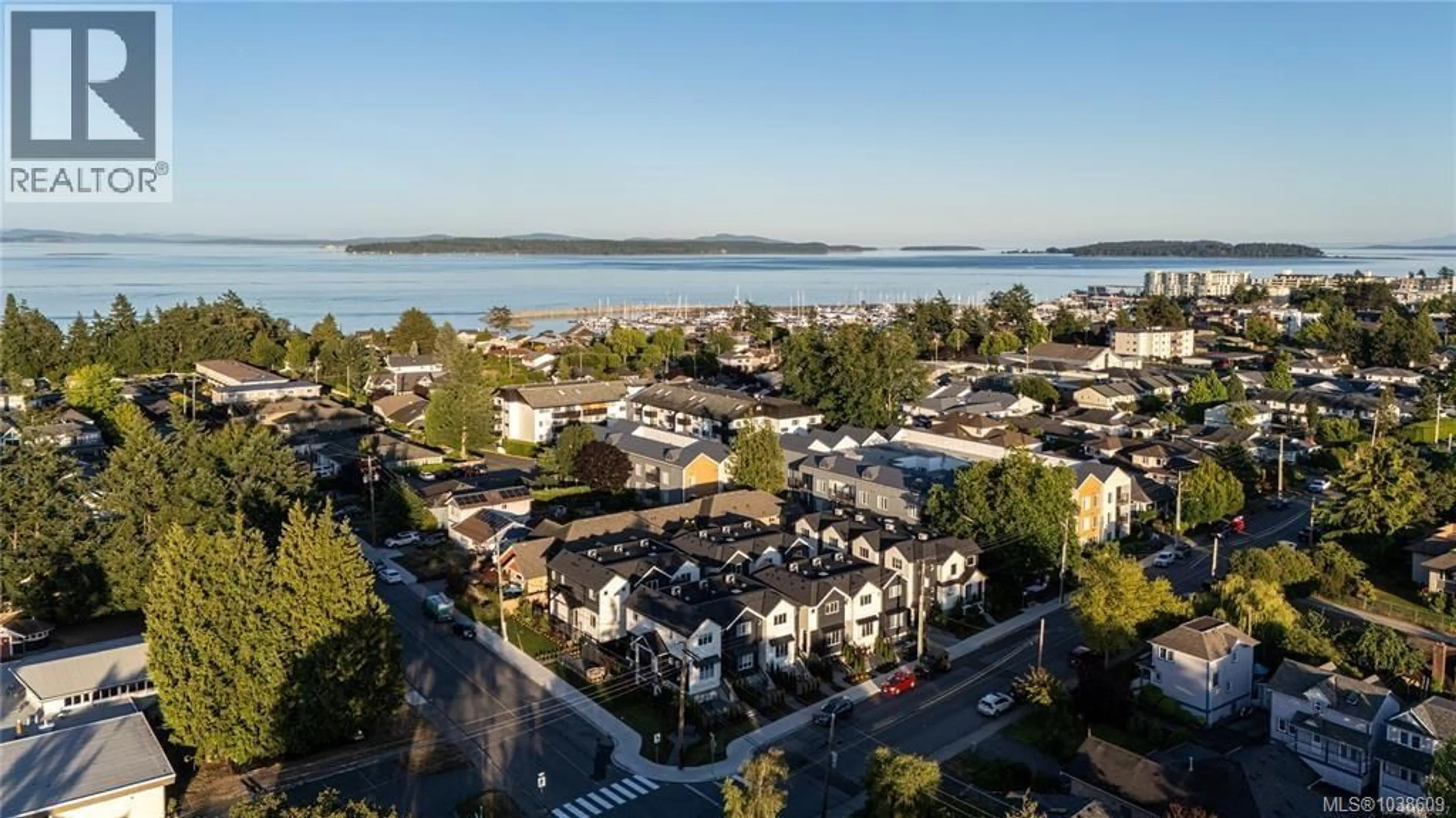 A pic from outside/outdoor area/front of a property/back of a property/a pic from drone, water/lake/river/ocean view for 8 - 10145 FIFTH STREET, Sidney British Columbia V8L2X8