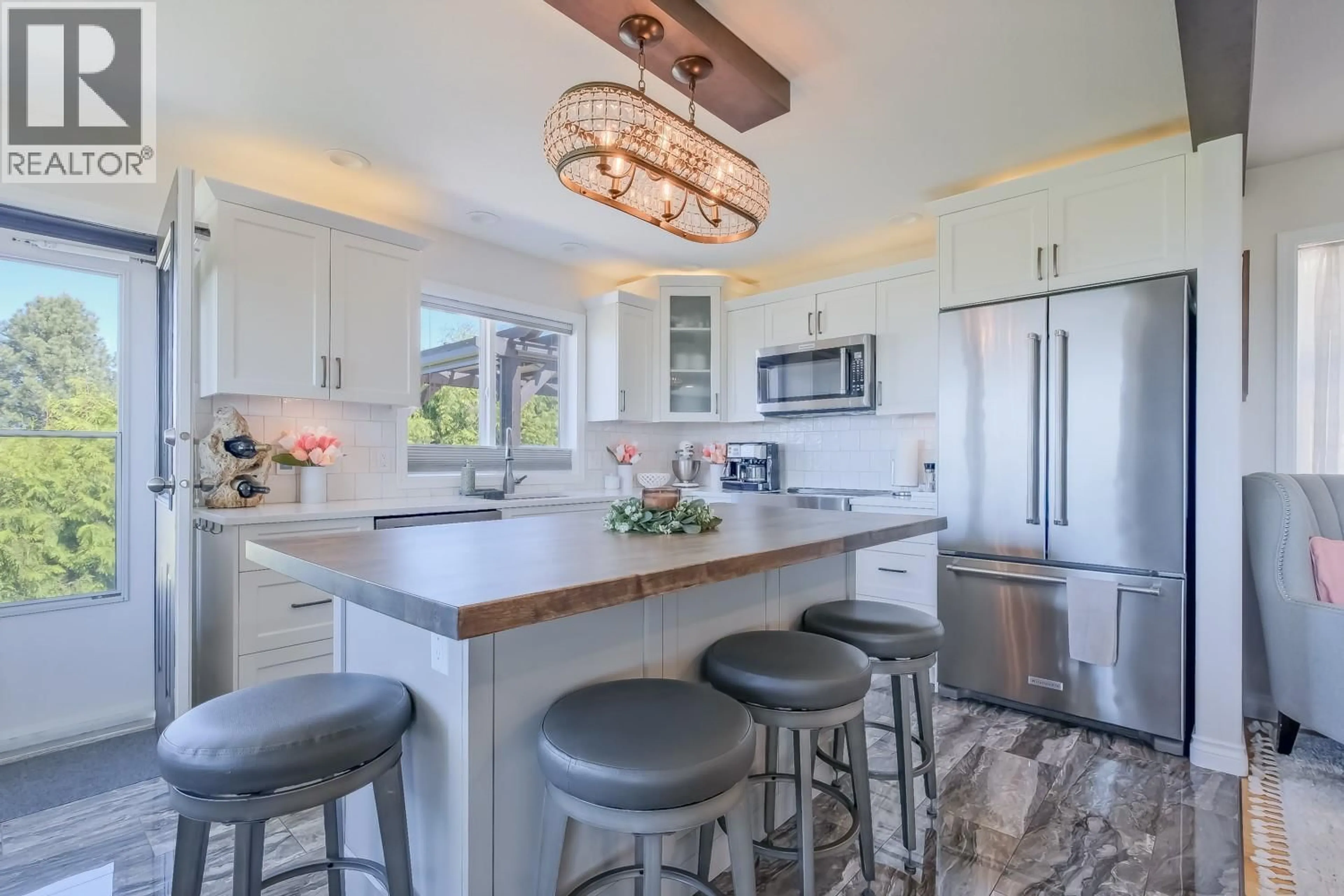 Open concept kitchen, ceramic/tile floor for 853 TOOVEY ROAD, Kelowna British Columbia V1X6R2