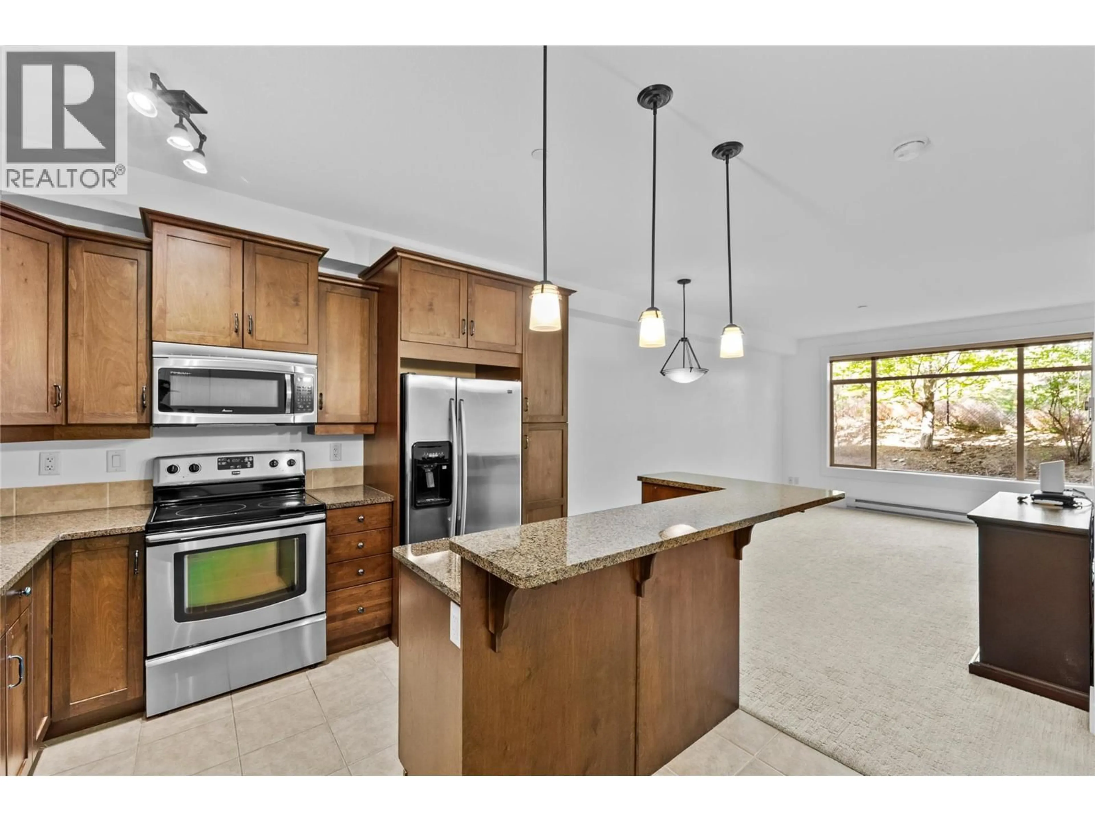 Open concept kitchen, ceramic/tile floor for 204 - 795 MCGILL ROAD, Kamloops British Columbia V2C0B9