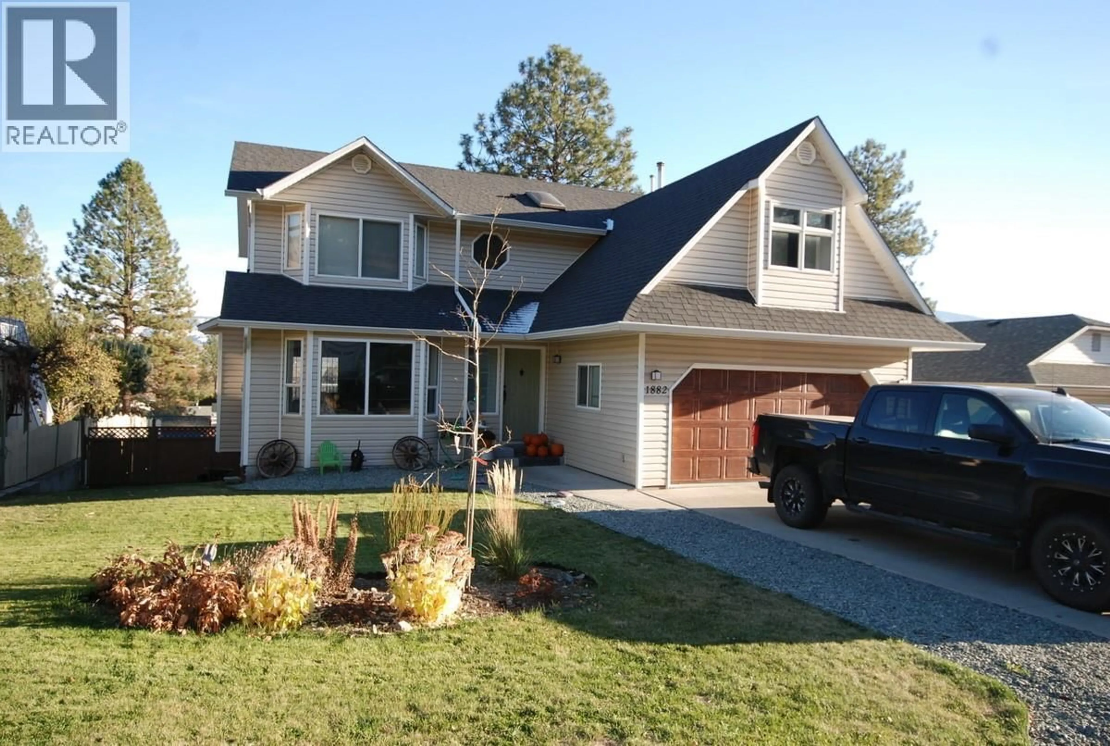 Home with vinyl exterior material, street for 1882 PINERIDGE DRIVE, Merritt British Columbia V1K1K4