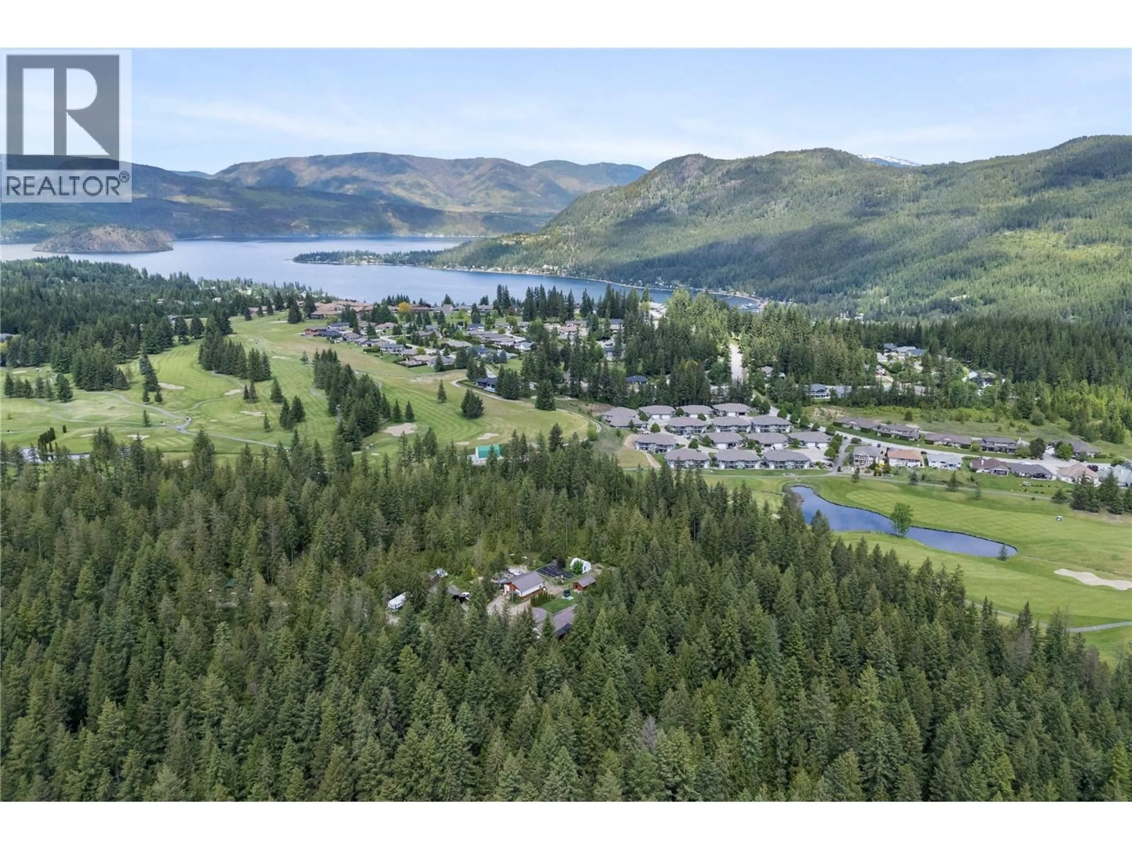 A pic from outside/outdoor area/front of a property/back of a property/a pic from drone, mountain view for 2681 TRANS CANADA HWY. OTHER, Sorrento British Columbia V0E2W0
