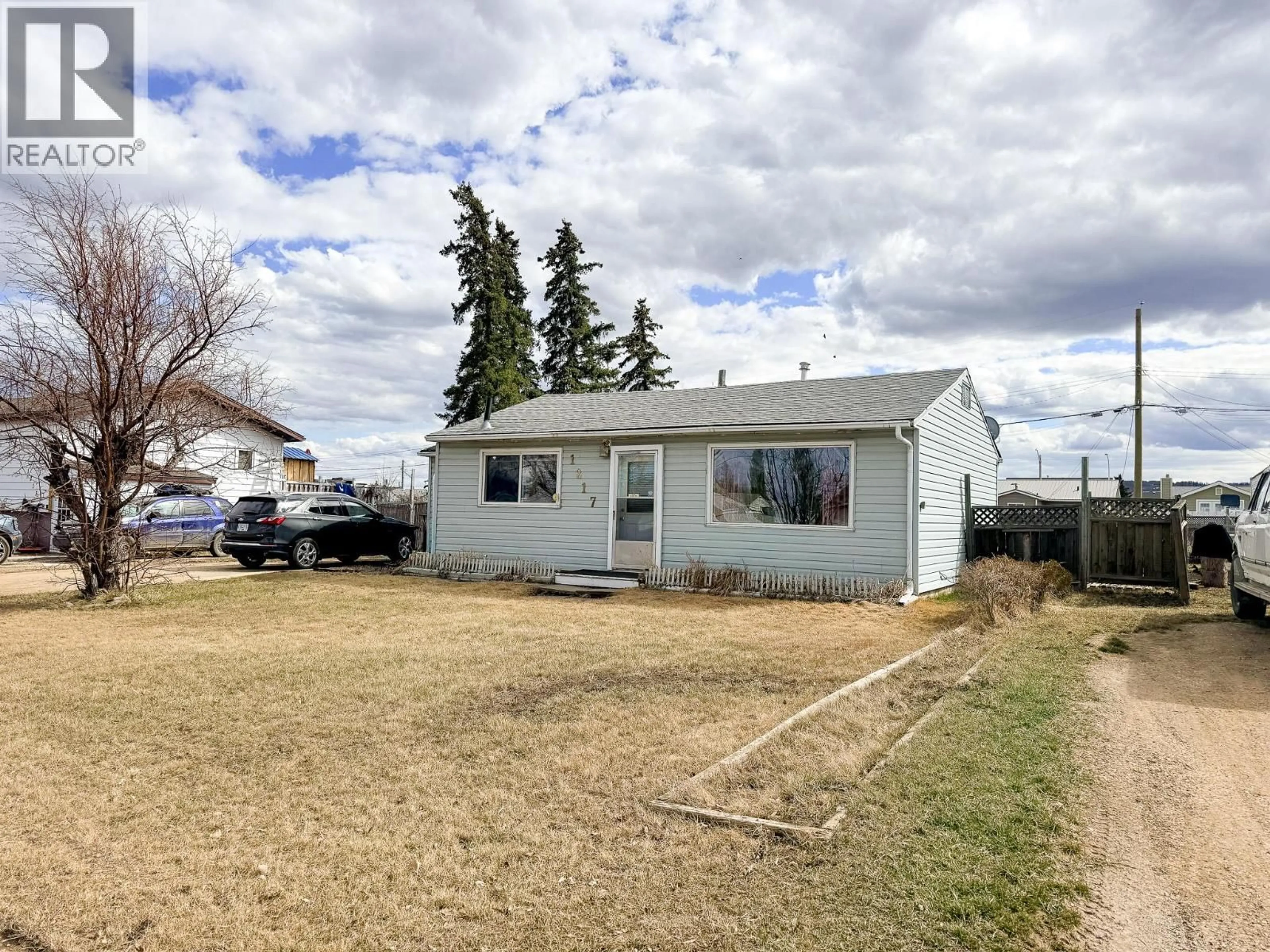 A pic from outside/outdoor area/front of a property/back of a property/a pic from drone, street for 1217 115 AVENUE, Dawson Creek British Columbia V1G3C2