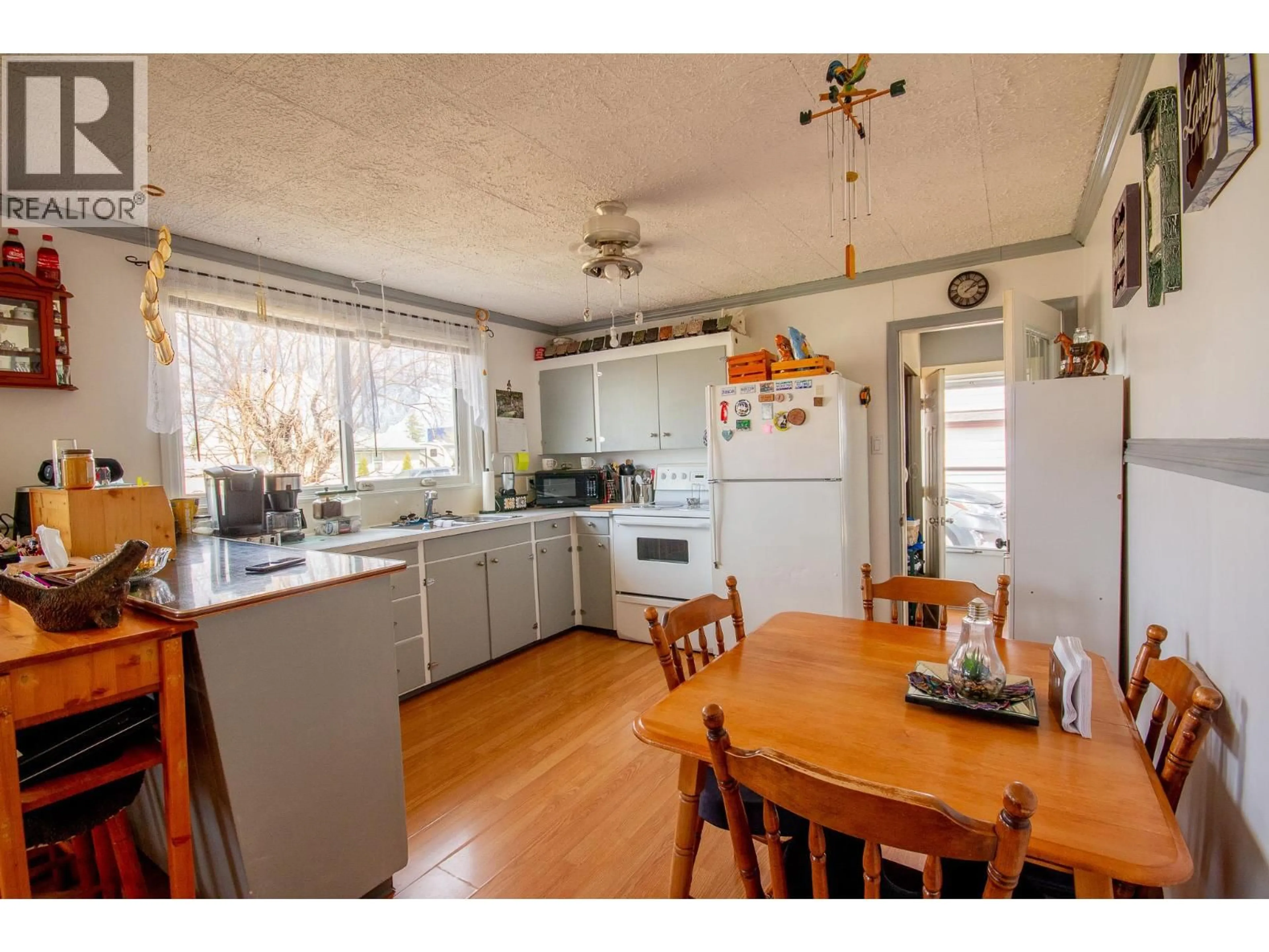 Standard kitchen, wood/laminate floor for 1217 115 AVENUE, Dawson Creek British Columbia V1G3C2