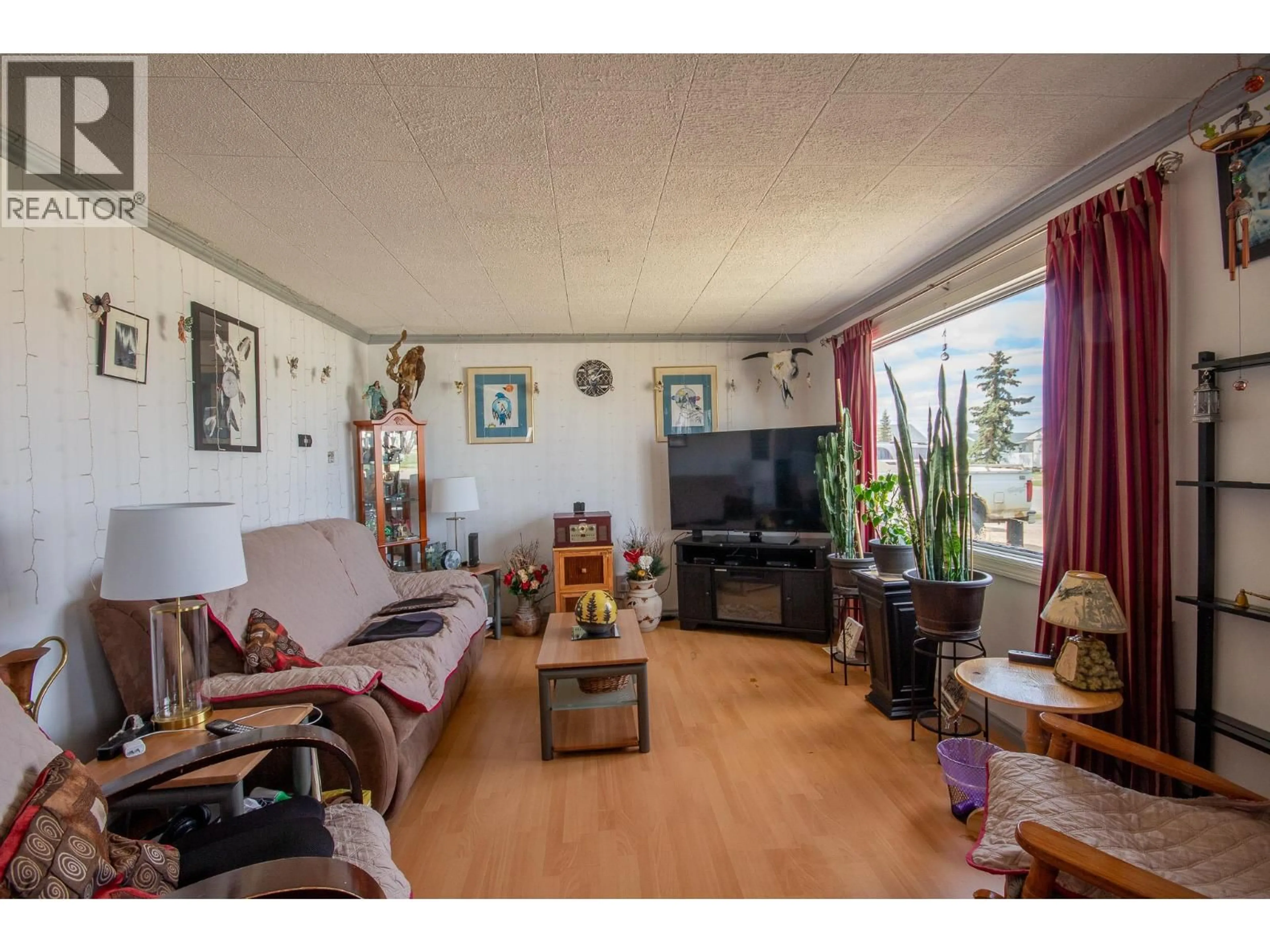Living room with furniture, unknown for 1217 115 AVENUE, Dawson Creek British Columbia V1G3C2