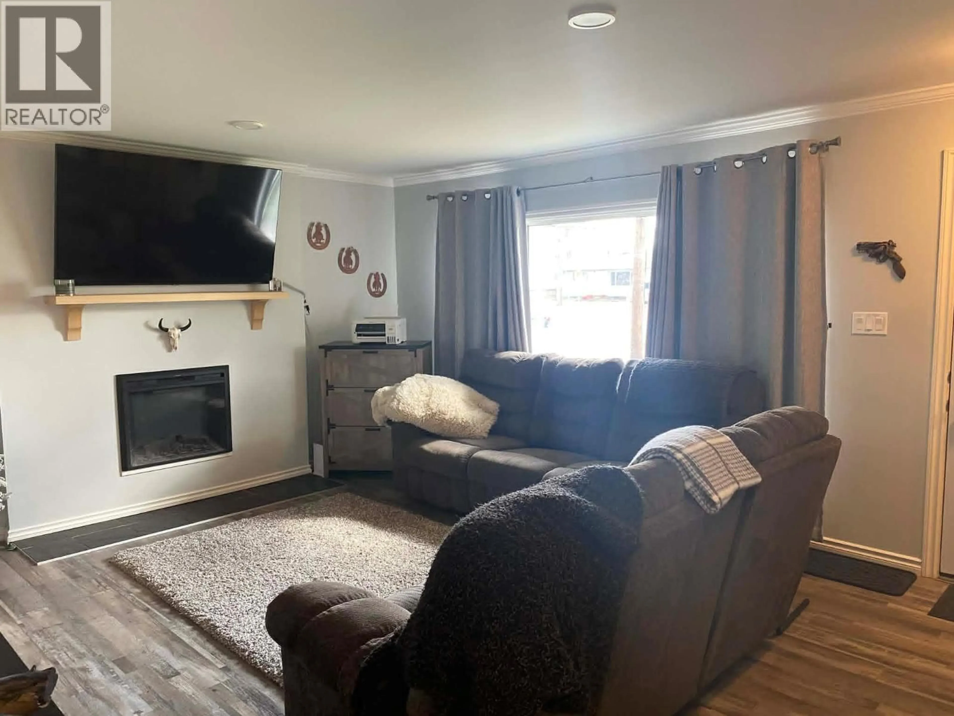 Living room with furniture, unknown for 4616 50 AVENUE, Chetwynd British Columbia V0C1J0