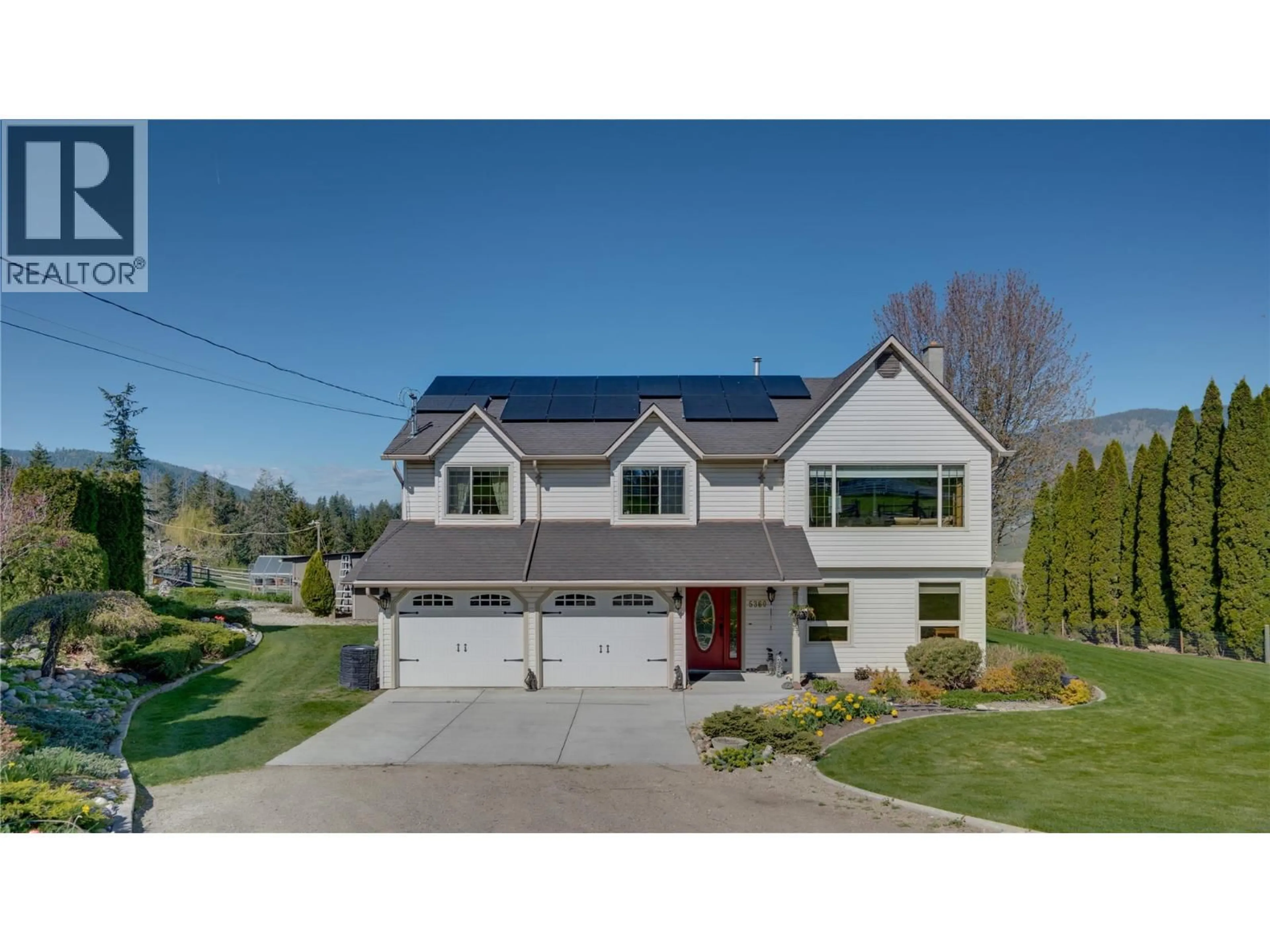 Home with vinyl exterior material, street for 5360 LEARMOUTH ROAD, Coldstream British Columbia V1B3E8