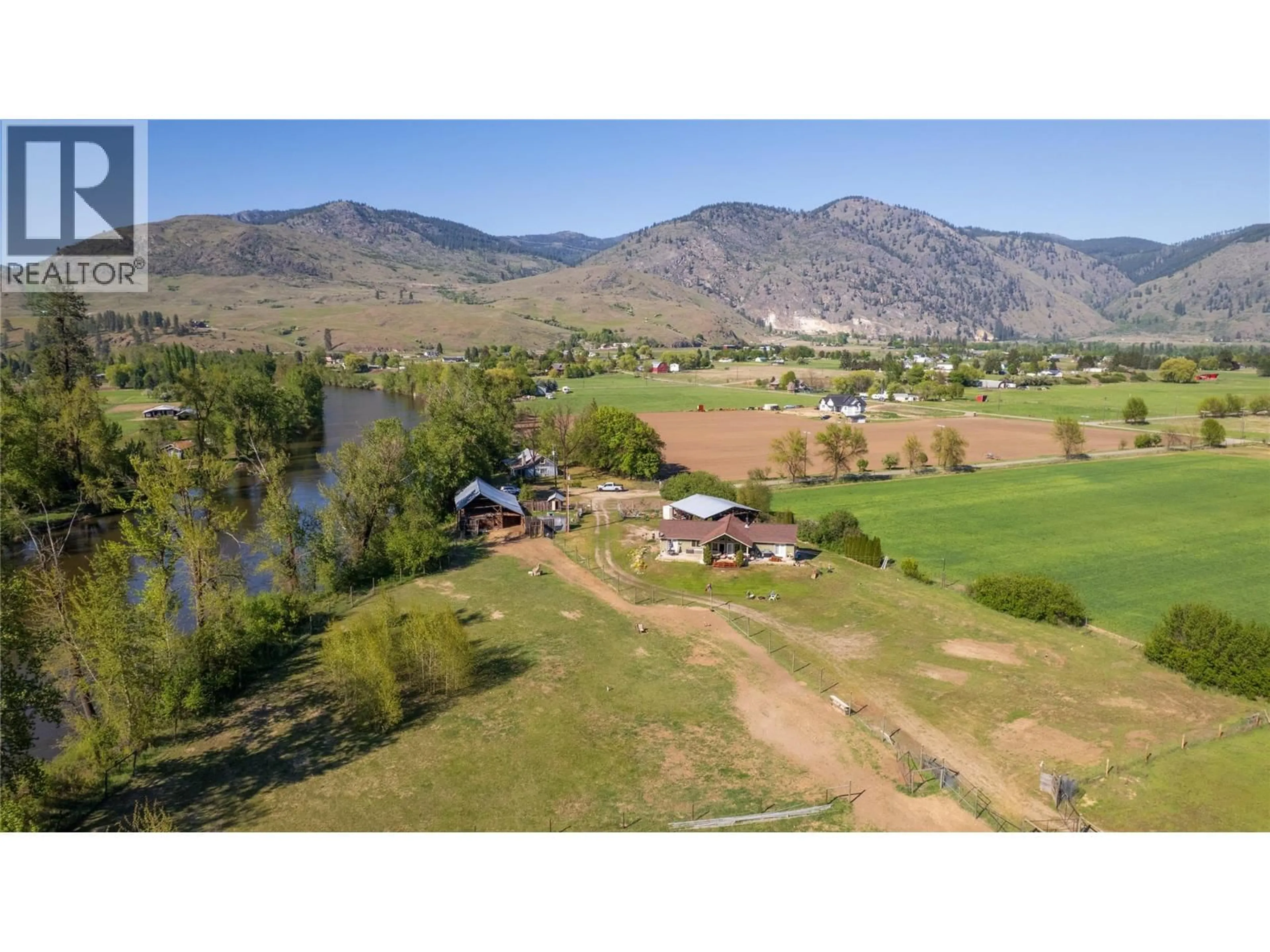 A pic from outside/outdoor area/front of a property/back of a property/a pic from drone, mountain view for 299 ANTIFAEV ROAD, Grand Forks British Columbia V0H1H9