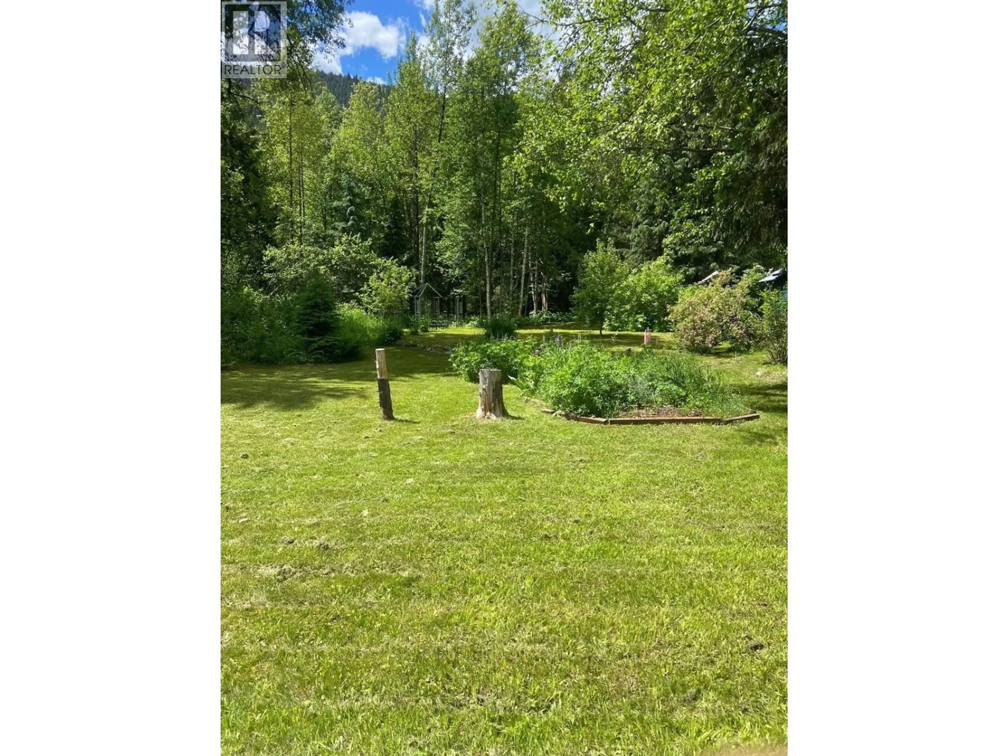 A pic from outside/outdoor area/front of a property/back of a property/a pic from drone, forest/trees view for 3777 FISHER ROAD, Blue River British Columbia V0E1C0