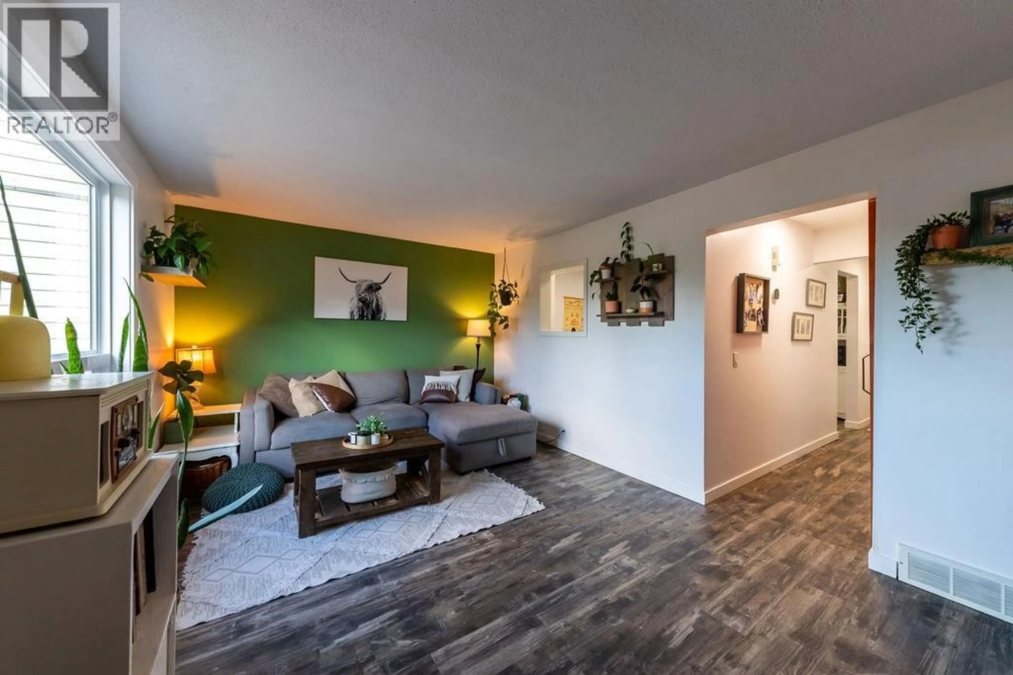 Living room with furniture, wood/laminate floor for 63 - 2576 SANDPIPER DRIVE DRIVE, Kamloops British Columbia V2B6X1